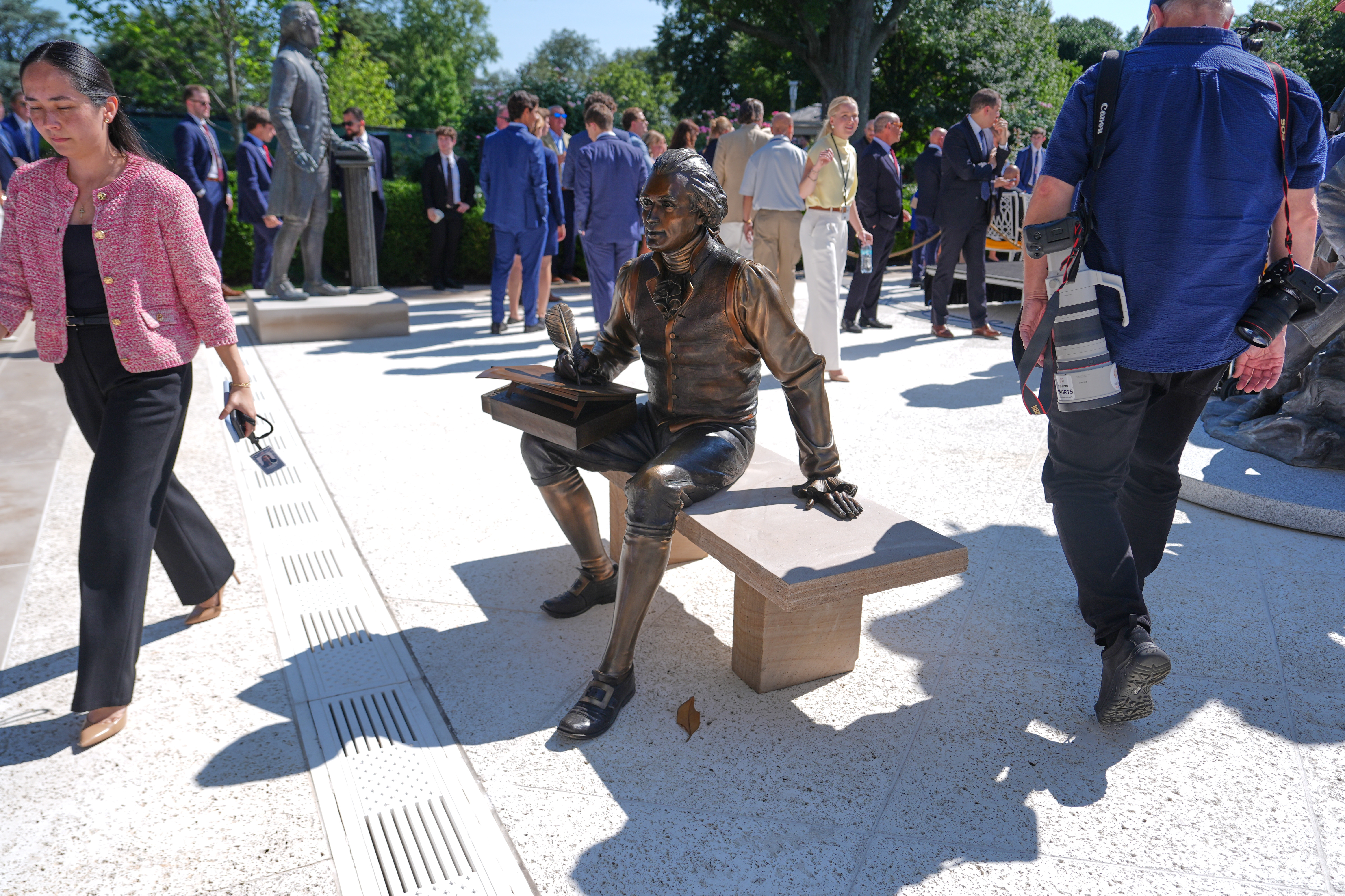 FILE - A bronze depiction of Thomas Jefferson seated and signing the Declaration of Independence is seen before President Donald Trump speaks during an event to honor the 2025 World Series champions Los Angeles Dodgers in the Rose Garden of the White House, July 23, 2026, in Washington. (AP Photo/Julia Demaree Nikhinson, File)