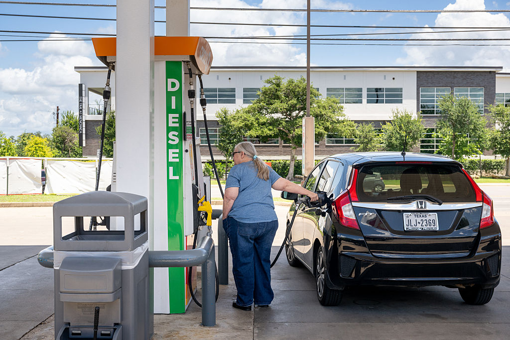 AUSTIN, TEXAS - JUNE 16: A person pumps gas at a Shell gas station on June 16, 2026 in Austin, Texas. Gas prices in the U.S. have fallen as wholesale gasoline and crude oil prices declined following the announcement of a preliminary agreement between the U.S. and Iran to end the war and open the Strait of Hormuz, a vital route for global oil exports. (Photo by Brandon Bell/Getty Images)