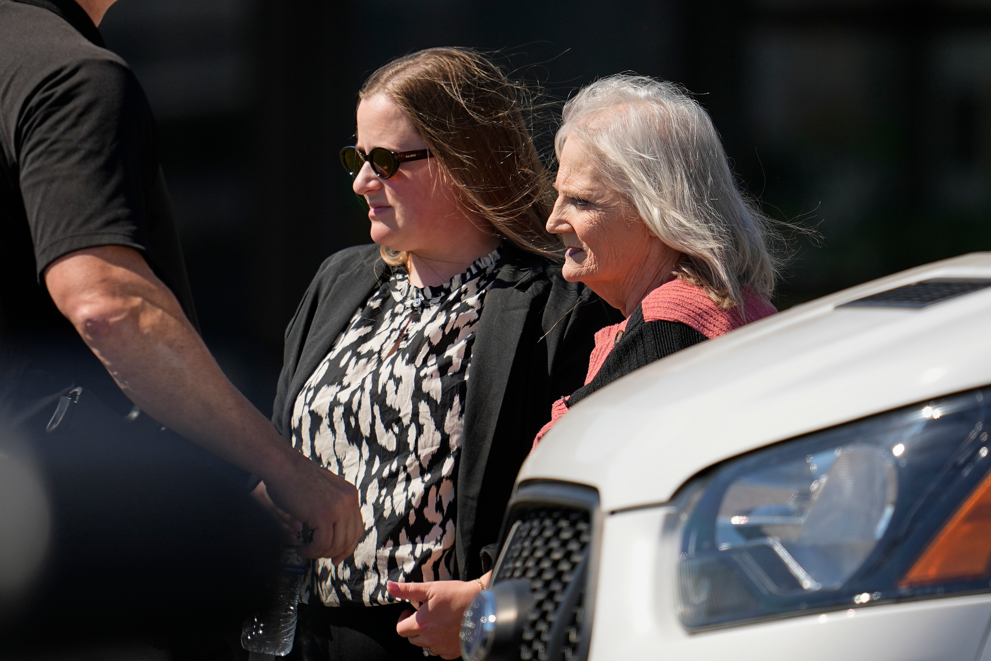 CORRECTS IDENTIFICATION TO RIGHT FROM LEFT - May Martinez, right, mother of murder victim Colleen Slemmer, walks out of Riverbend Maximum Security Institution during a stay of the planned execution of Christa Pike, Wednesday, Sept. 30, 2026, in Nashville, Tenn. (AP Photo/George Walker IV)