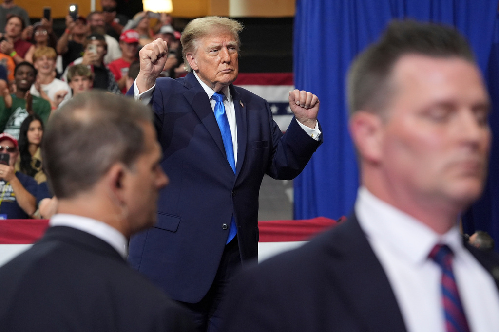 President Donald Trump dances as he departs after speaking during an event at Butler High School in Vandalia, Ohio, Saturday, Oct. 3, 2026. (AP Photo/Mark Schiefelbein)