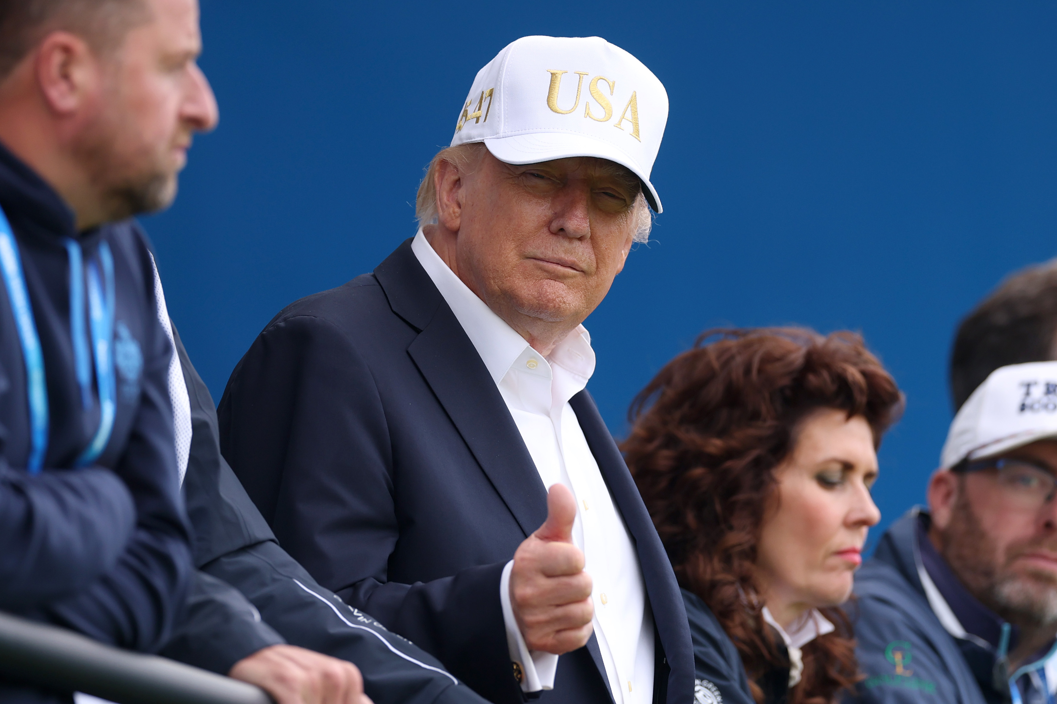 President Donald Trump gestures a thumbs up as he looks across the 18th green on day three of the Amgen Irish Open at Trump International Golf Links in Doonbeg on September 12, 2026 in Clarecastle, Ireland (Photo by Warren Little/Getty Images)