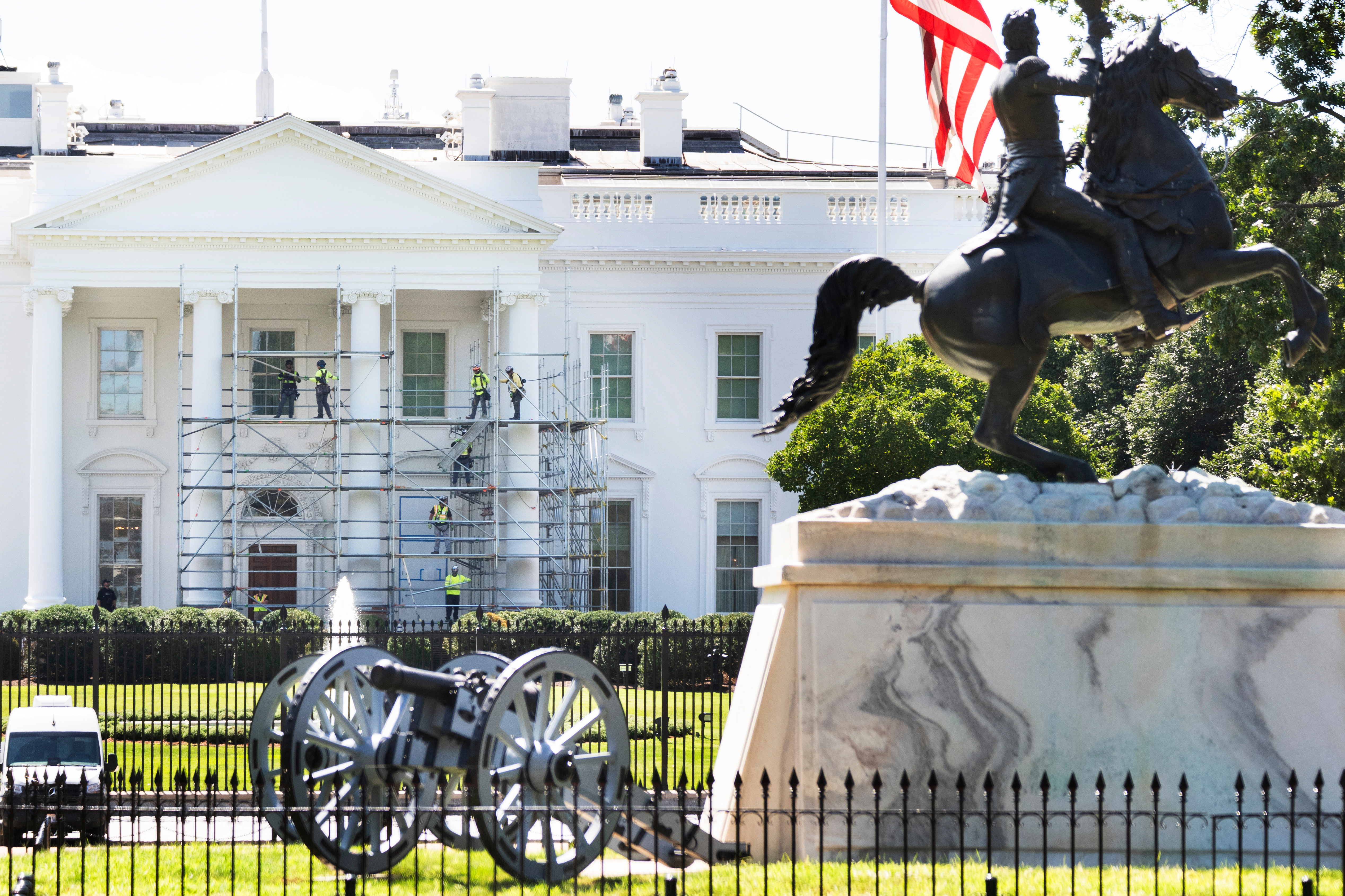 Workers remove the scaffolding surrounding the North Portico of the White House, Monday, Sep. 7, 2026, in Washington. (AP Photo/Manuel Balce Ceneta)