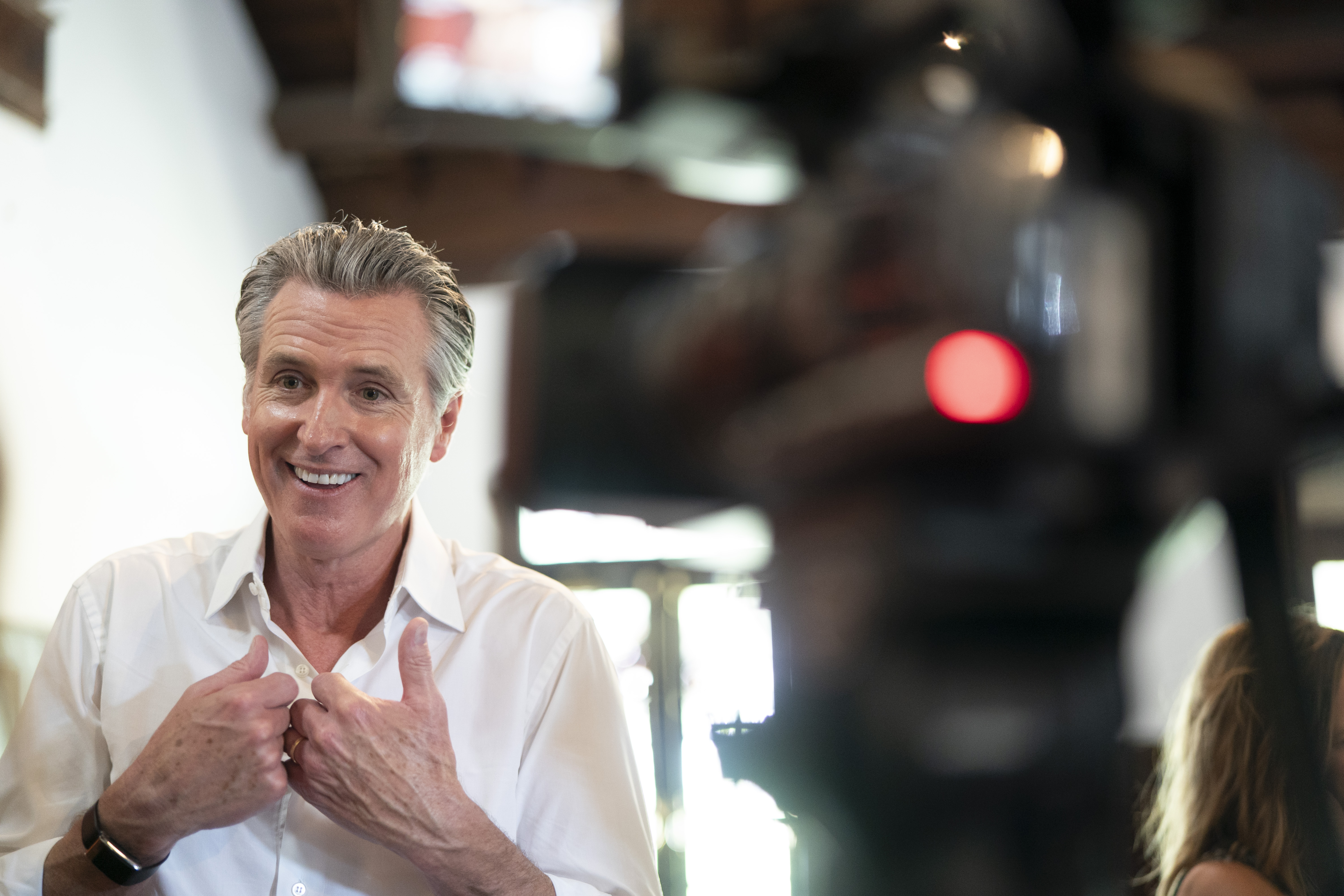 ST. HELENA ISLAND, SOUTH CAROLINA - SEPTEMBER 3: Potential 2028 presidential candidate, California Gov. Gavin Newsom talks to a TV news reporter during an event held by the state Democratic Party at the Penn Center on September 3, 2026 on St. Helena Island, South Carolina. Newsom is touring the state aiming to rally Democrats ahead of the November midterm elections. South Carolina is the first primary state in the 2028 presidential election. (Photo by Sean Rayford/Getty Images)