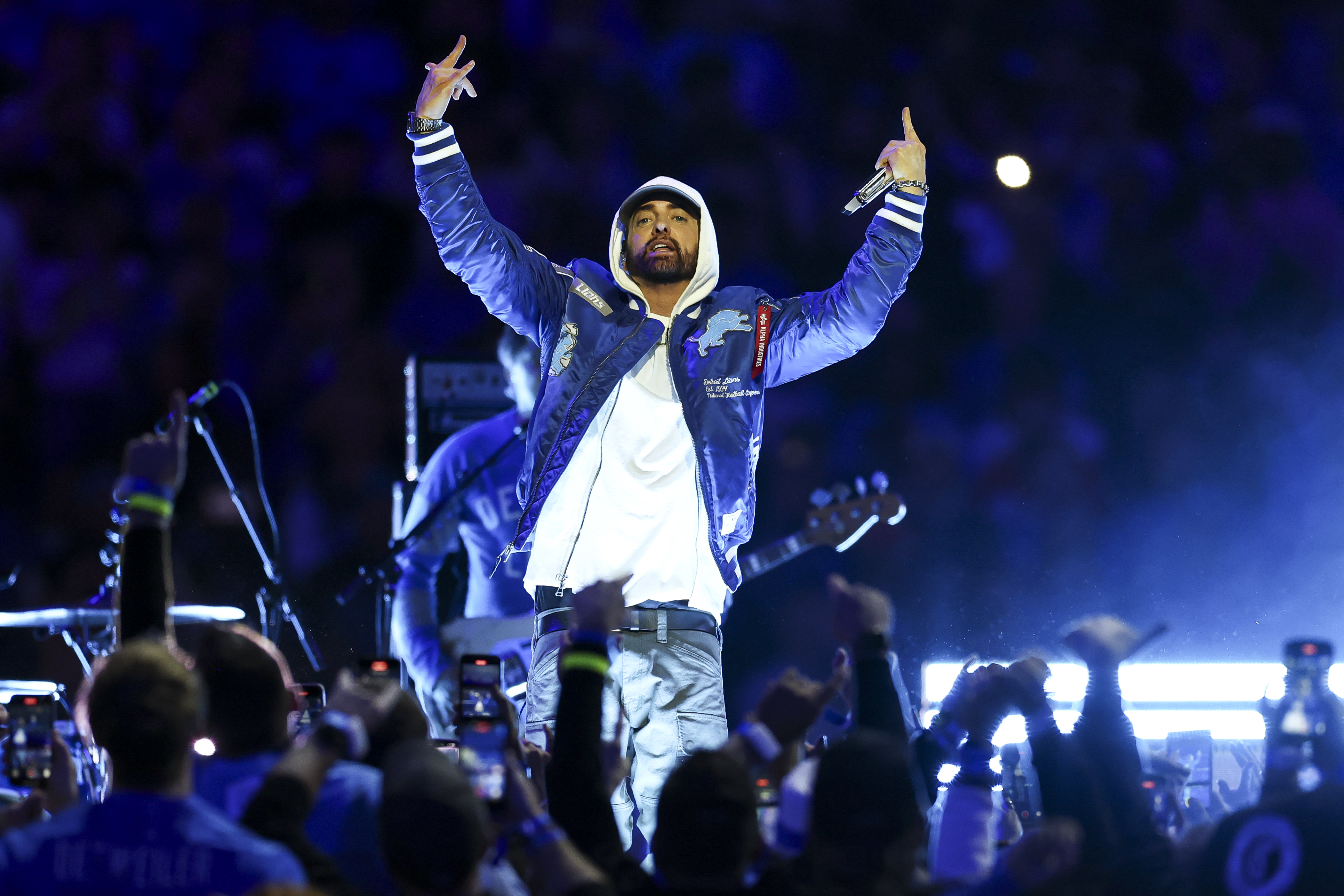 DETROIT, MICHIGAN - NOVEMBER 27: Eminem performs during halftime of a Thanksgiving NFL football game between the Detroit Lions and the Green Bay Packers at Ford Field on November 27, 2025 in Detroit, Michigan. (Photo by Kevin Sabitus/Getty Images)