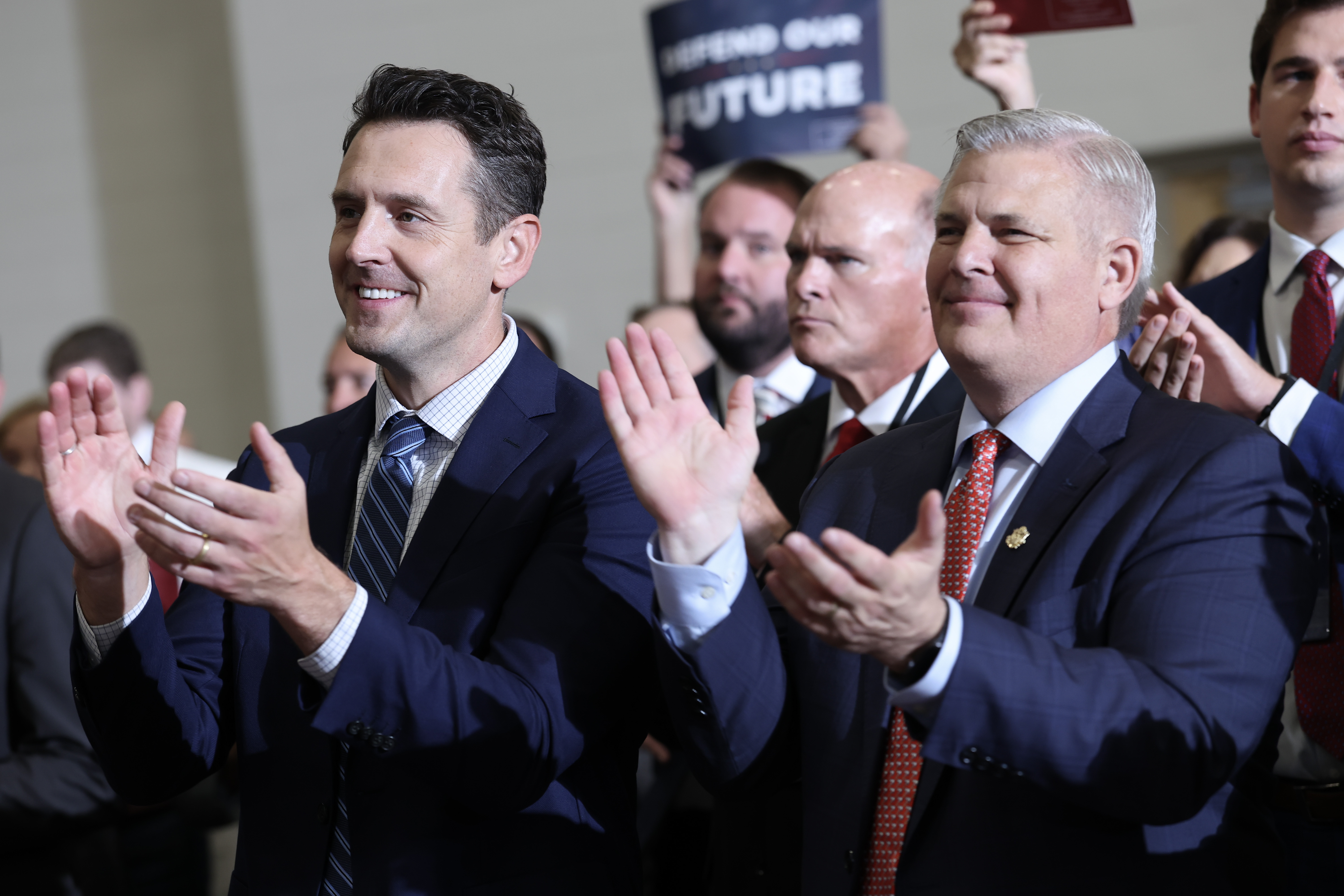 Iowa Republican gubernatorial candidate Zach Lahn and Iowa Republican Congressional candidate Chris McGowan listen as Vice President JD Vance speaks during a Republican National Committee’s Midterm Rally at the Mid-America Center on September 18, 2026 in Council Bluffs, Iowa (Photo by Anna Moneymaker/Getty Images)