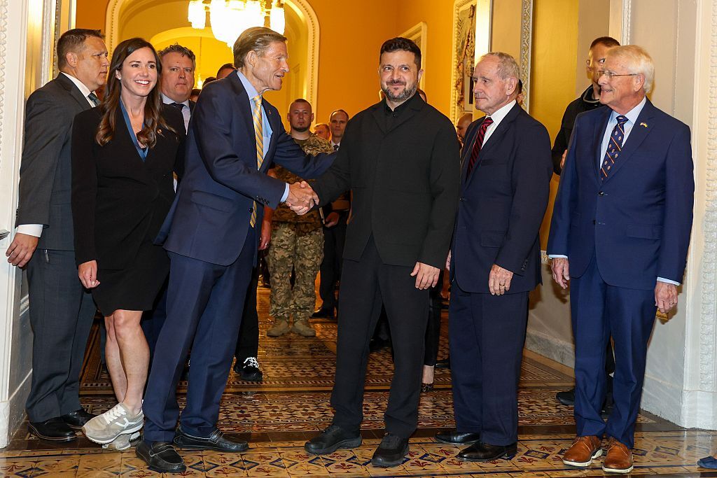 WASHINGTON, DC - JULY 28: (L-R) Sen. Katie Britt (R-Ala.), Sen. Richard Blumenthal (D-CT), Ukraine President Volodymyr Zelensky, Sen. James Risch (R-ID), Sen. Roger Wicker (R-MS) and Sen. Jeanne Shaheen (D-NH) chat before they head to a closed door meeting at the US Capitol on July 28, 2026 in Washington, DC. President Zelenskyy came to the United States to attend the funeral service for the late U.S. Sen. Lindsey Graham. (Photo by Tasos Katopodis/Getty Images)