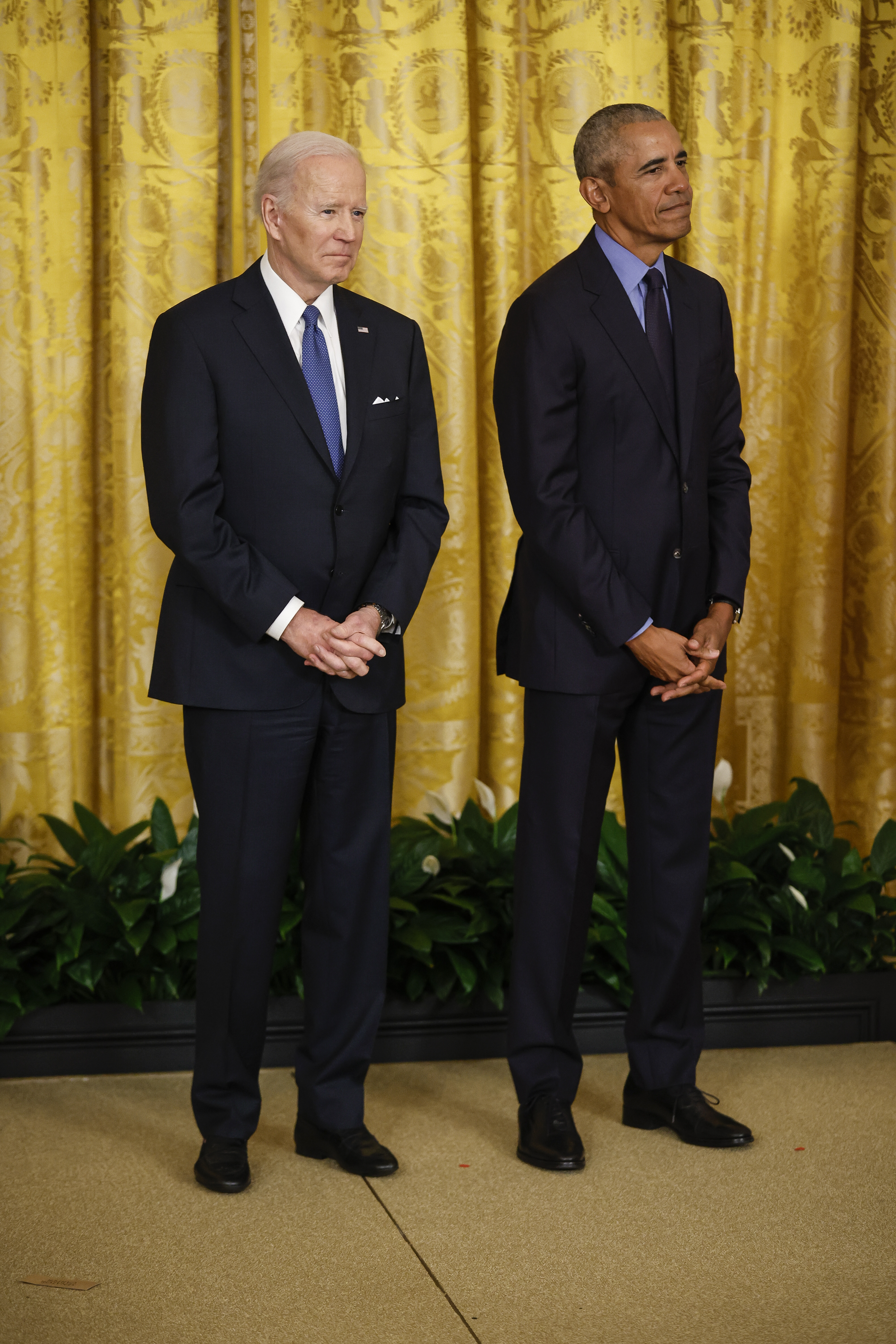 WASHINGTON, DC - APRIL 5: U.S. President Joe Biden and former President Barack Obama attend an event to mark the 2010 passage of the Affordable Care Act in the East Room of the White House on April 5, 2022 in Washington, DC. With then-Vice President Joe Biden by his side, Obama signed 'Obamacare' into law on March 23, 2010. (Photo by Chip Somodevilla/Getty Images)
