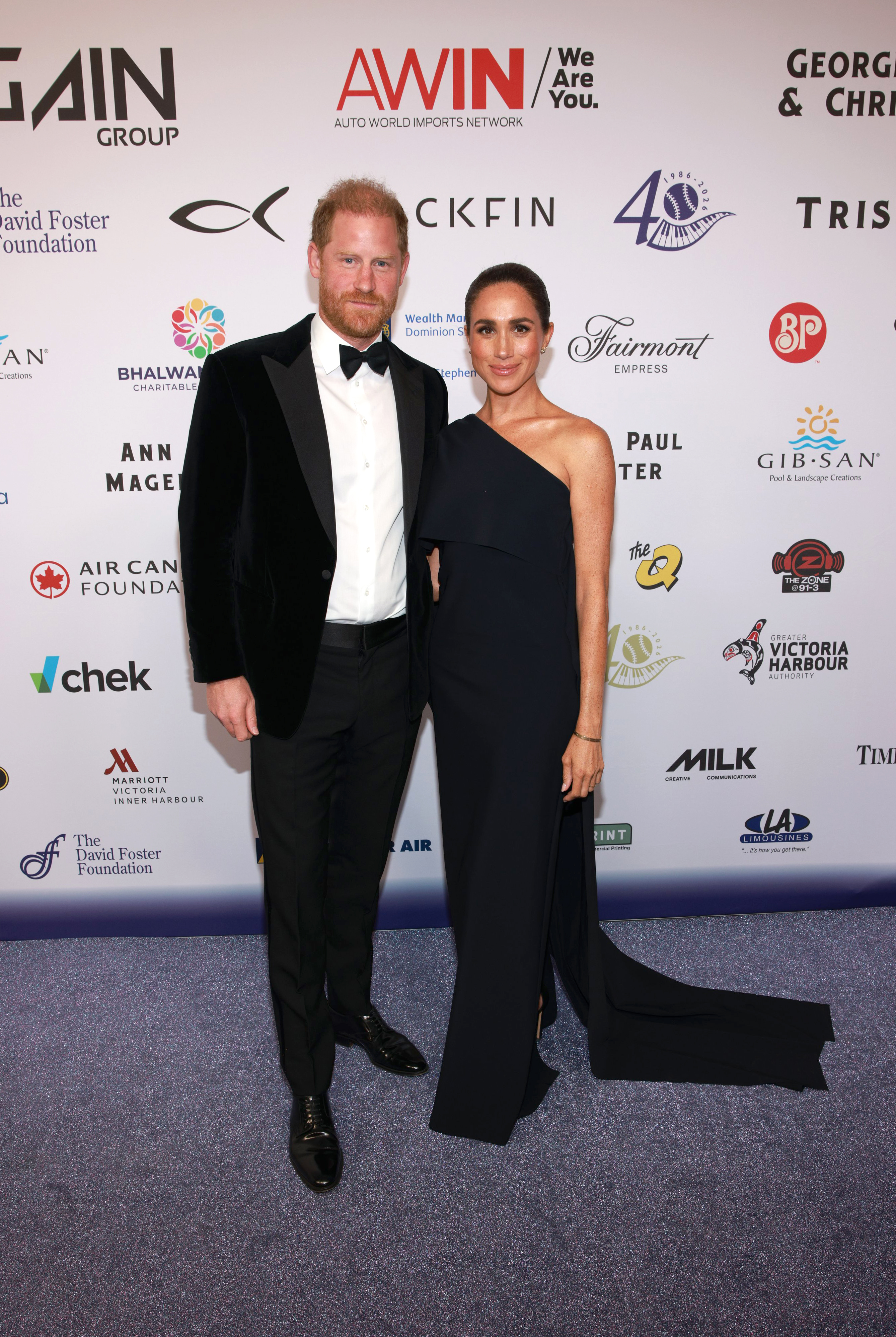 VICTORIA, BRITISH COLUMBIA - AUGUST 07: Prince Harry, Duke of Sussex (L) and Meghan, Duchess of Sussex attend the David Foster Foundation 40th Anniversary Celebration on August 07, 2026 in Victoria, British Columbia. (Photo by Vito Amati/The David Foster Foundation via Getty Images)