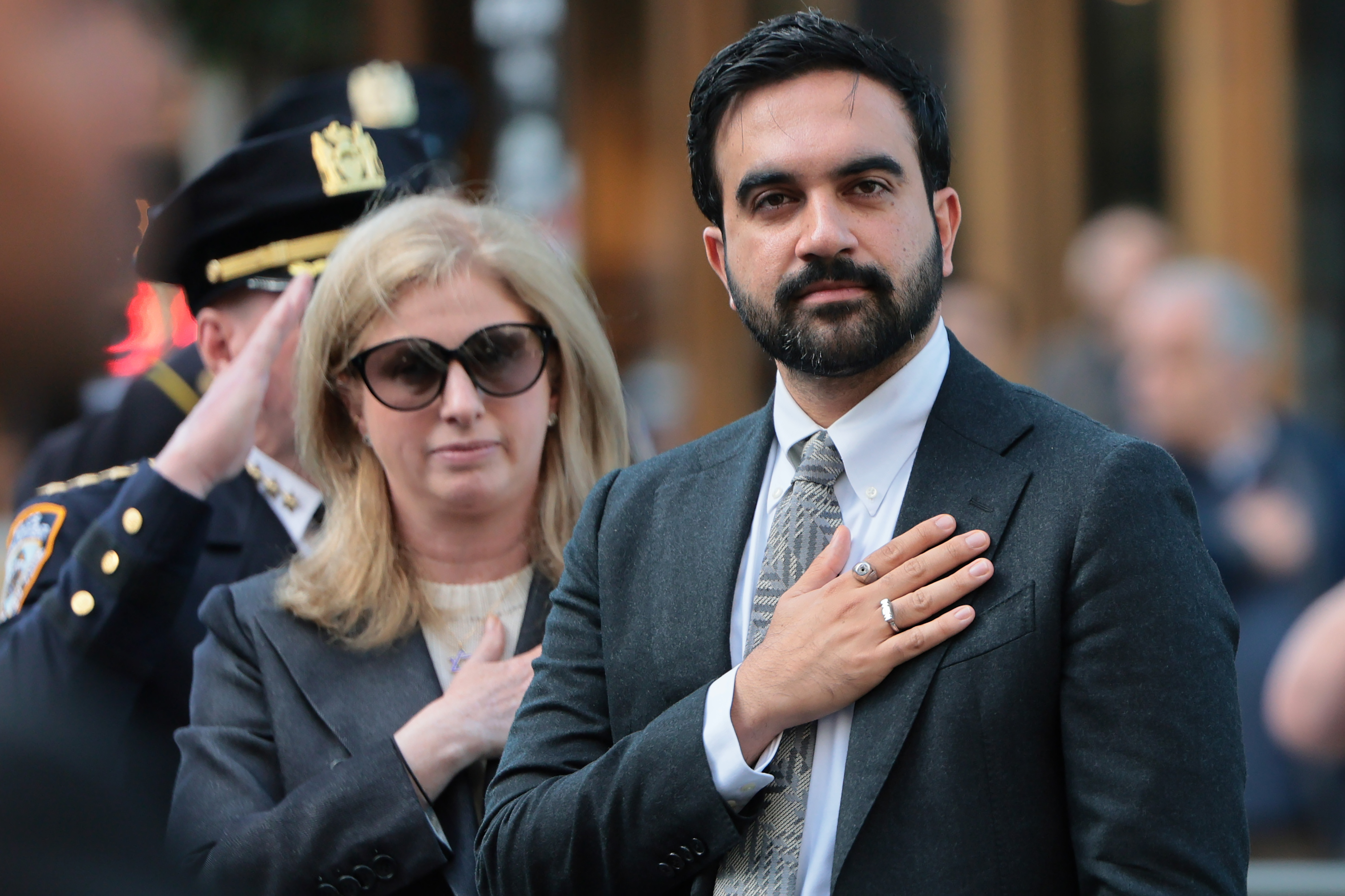 NEW YORK, NEW YORK - OCTOBER 13: New York Police Commissioner Jessica Tisch and Mayor Zohran Mamdani attend a ceremony at the NYPD Memorial Wall on October 13, 2026 in New York City. Mayor Mamdani was joined by New York Police Commissioner Jessica Tisch as added names of 42 fallen NYPD officers are unveiled at the memorial wall. The wall honors every NYPD officer who dies in the line of duty.  (Photo by Michael M. Santiago/Getty Images)