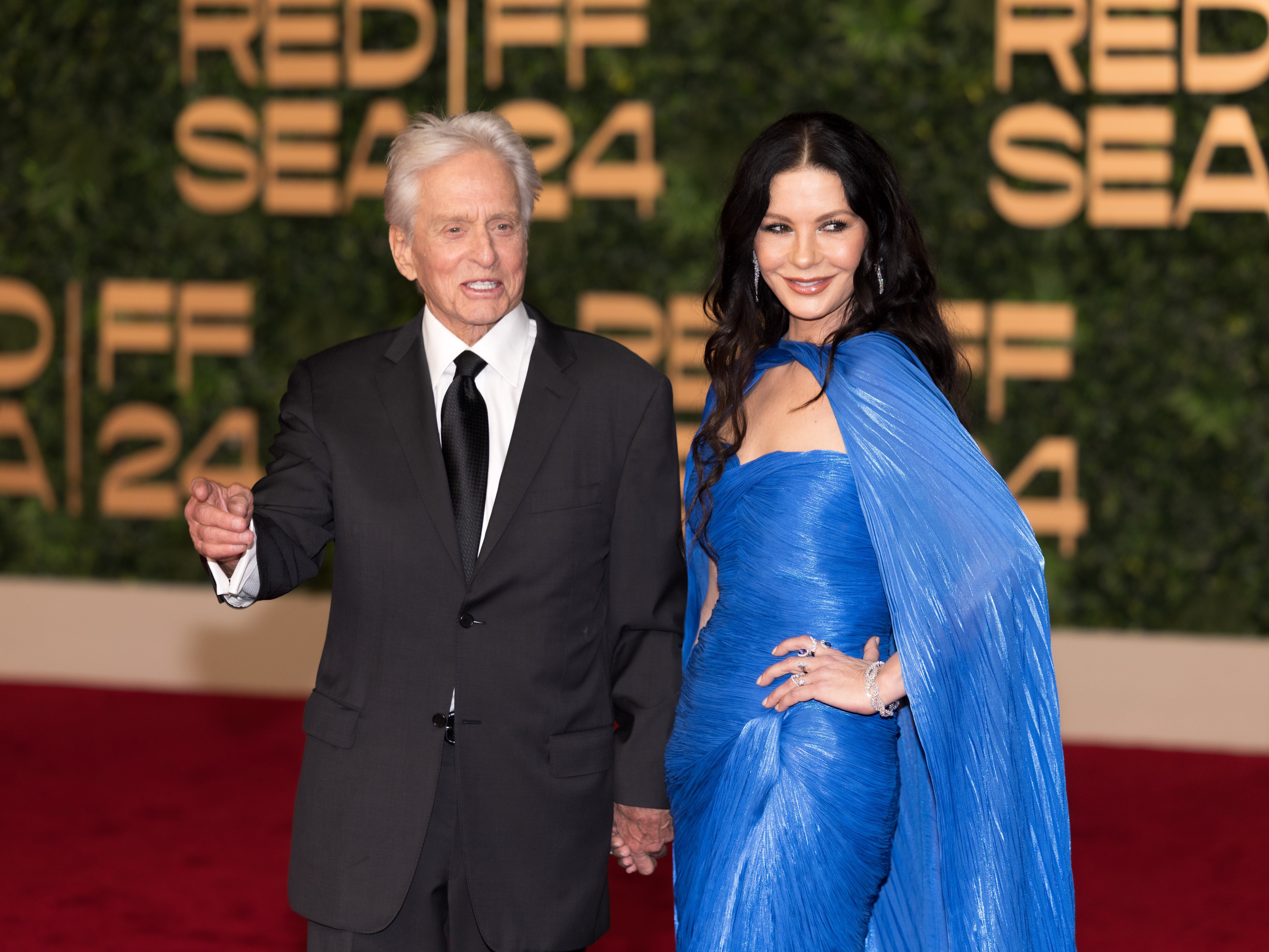 JEDDAH, SAUDI ARABIA - DECEMBER 05: Michael Douglas and Catherine Zeta-Jones attend the Opening Ceremony of The Red Sea International Film Festival 2024 on December 05, 2024 in Jeddah, Saudi Arabia. (Photo by Arnold Jerocki/Getty Images)