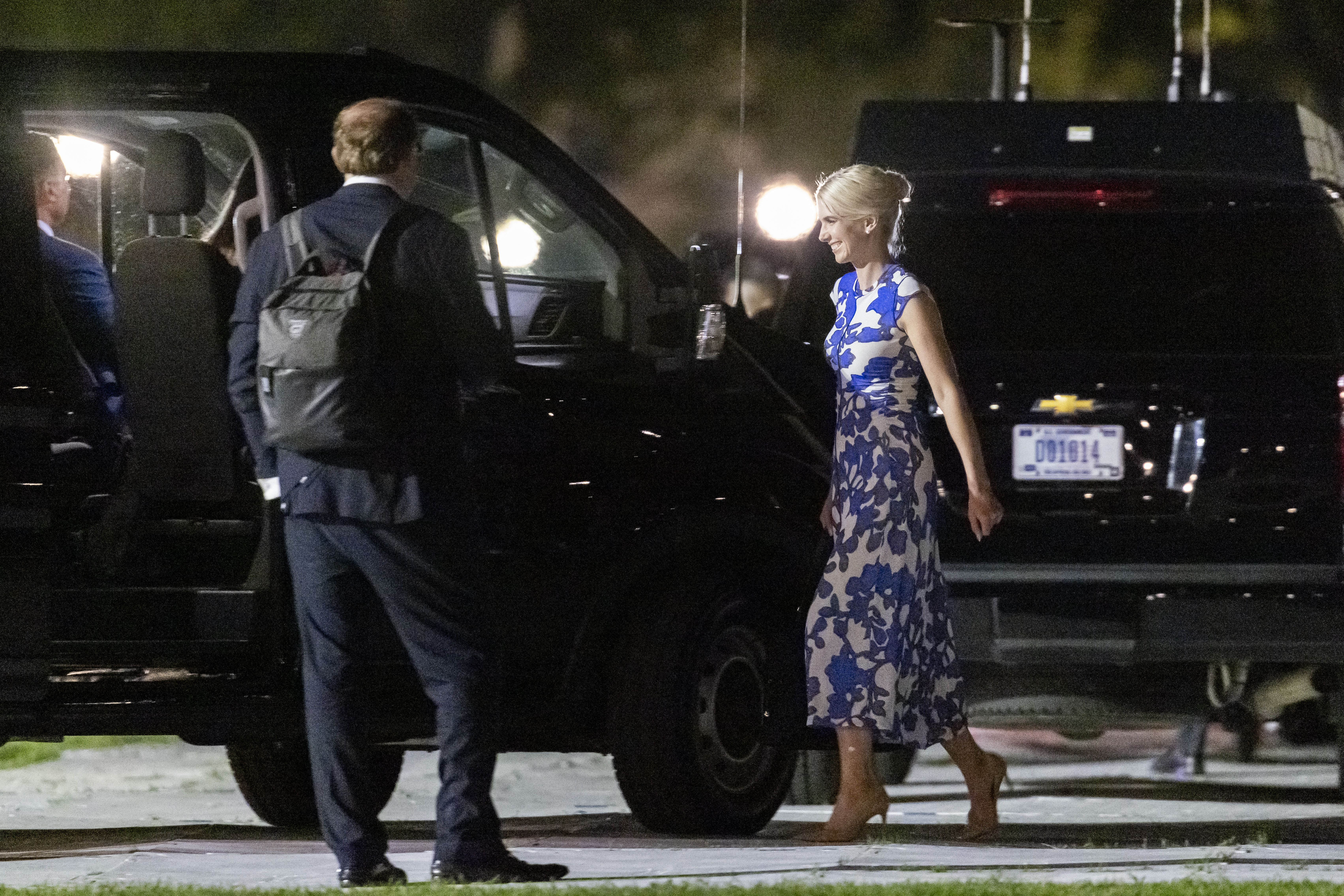 WASHINGTON, DC - AUGUST 21: Executive assistant to U.S. President Donald Trump, Natalie Harp, walks to the motorcade after disembarking Marine One on the Ellipse near the White House on August 21, 2026 in Washington, DC. President Trump traveled to South Carolina for a campaign rally with Darline Graham. (Photo by Finn Gomez/Getty Images)