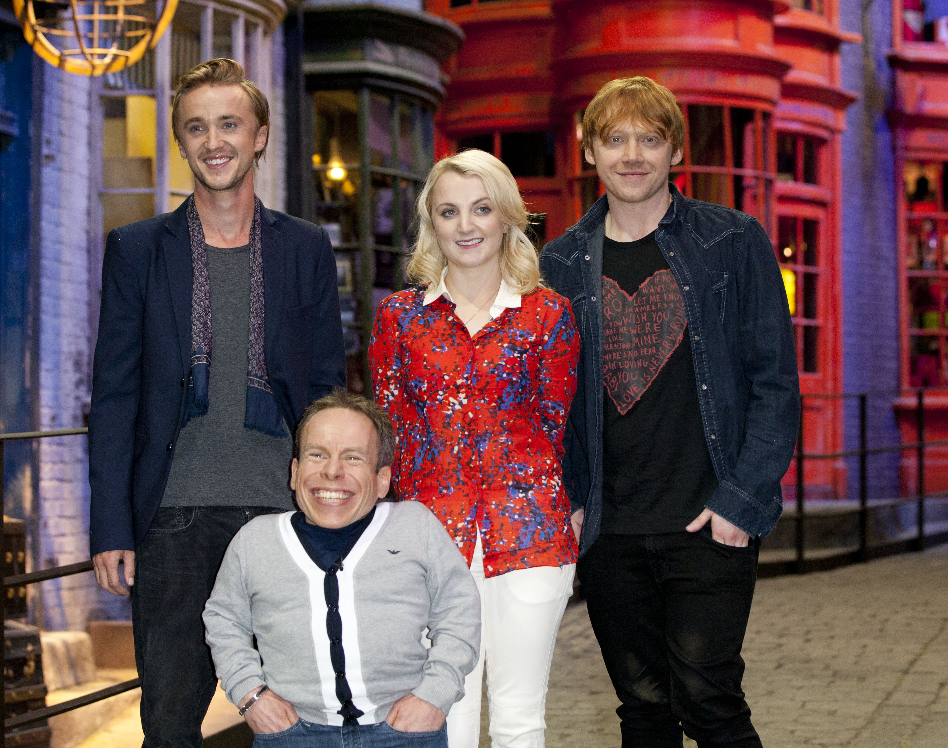 Actors Tom Felton, Warwick Davis, Evanna Lynch And Rupert Grint Attend A Photocall To Launch The Warner Bros. Studio Tour London - The Making Of Harry Potter, At Leavesden Studios In Hertfordshire (John Phillips/UK Press via Getty Images)