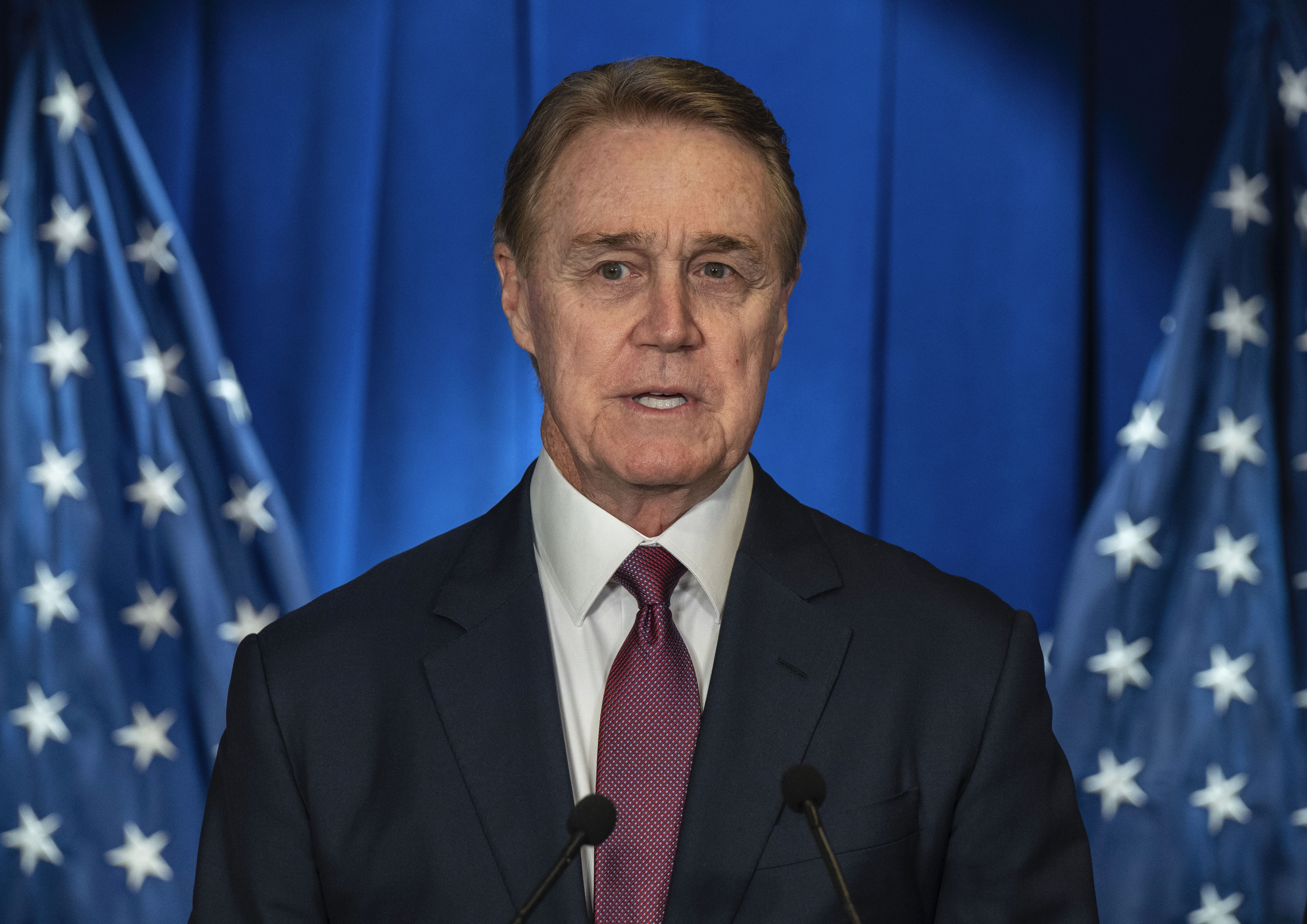 US Ambassador to Beijing David Perdue speaks during a press conference with members of a Congressional delegation at the US Embassy on September 23, 2025 in Beijing, China (Photo by Kevin Frayer/Getty Images)