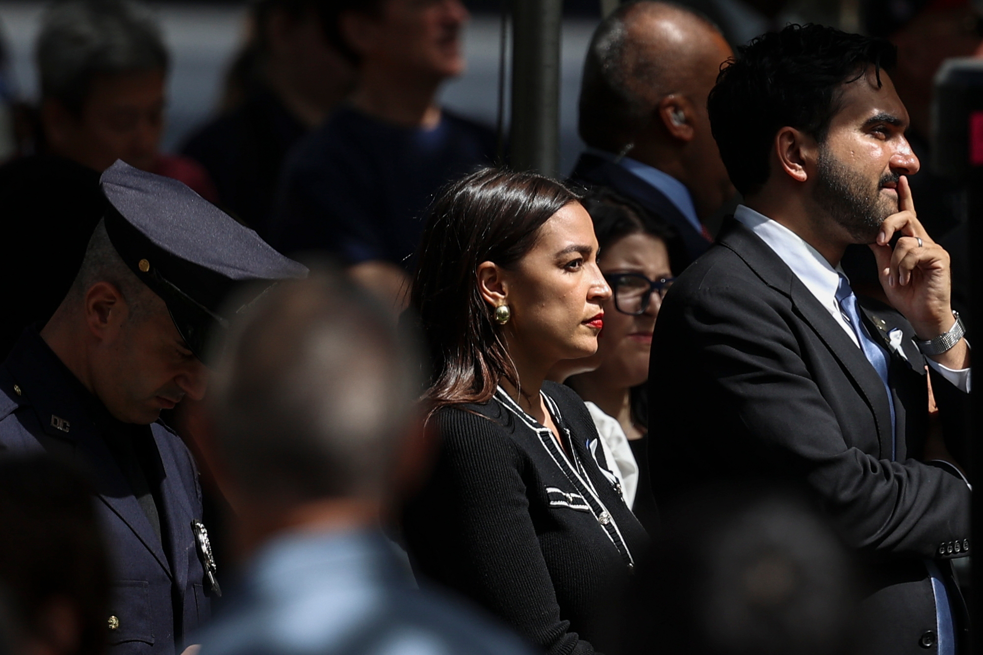 U.S. Rep. Alexandria Ocasio-Cortez, D-N.Y., and New York City Mayor Zohran Mamdani participate in a memorial on the 25th anniversary of the September 11, 2001, terrorist attacks, Friday, Sept. 11, 2026, in New York. (AP Photo/Pamela Smith)