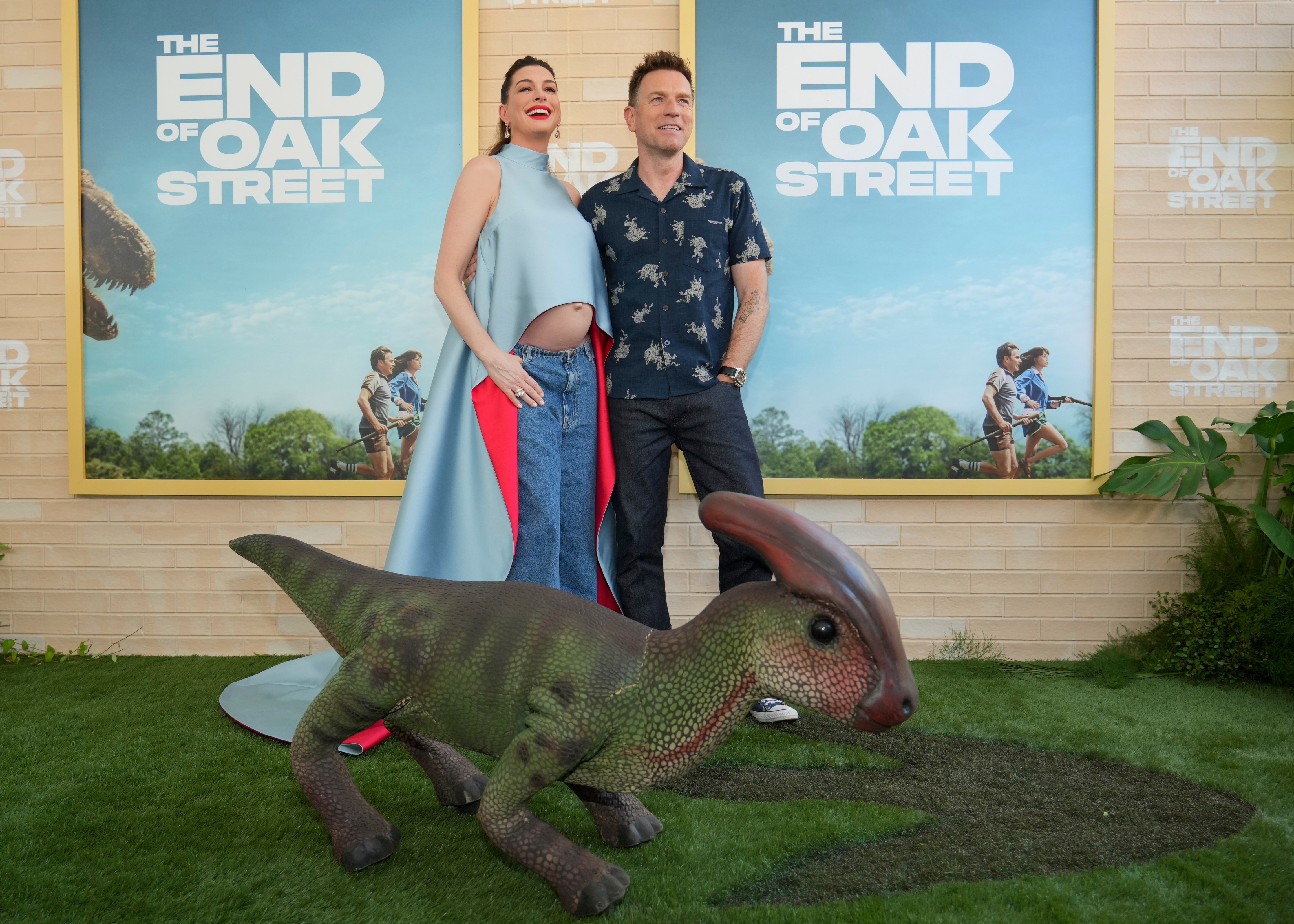 Anne Hathaway, left, and Ewan McGregor arrive at the premiere of