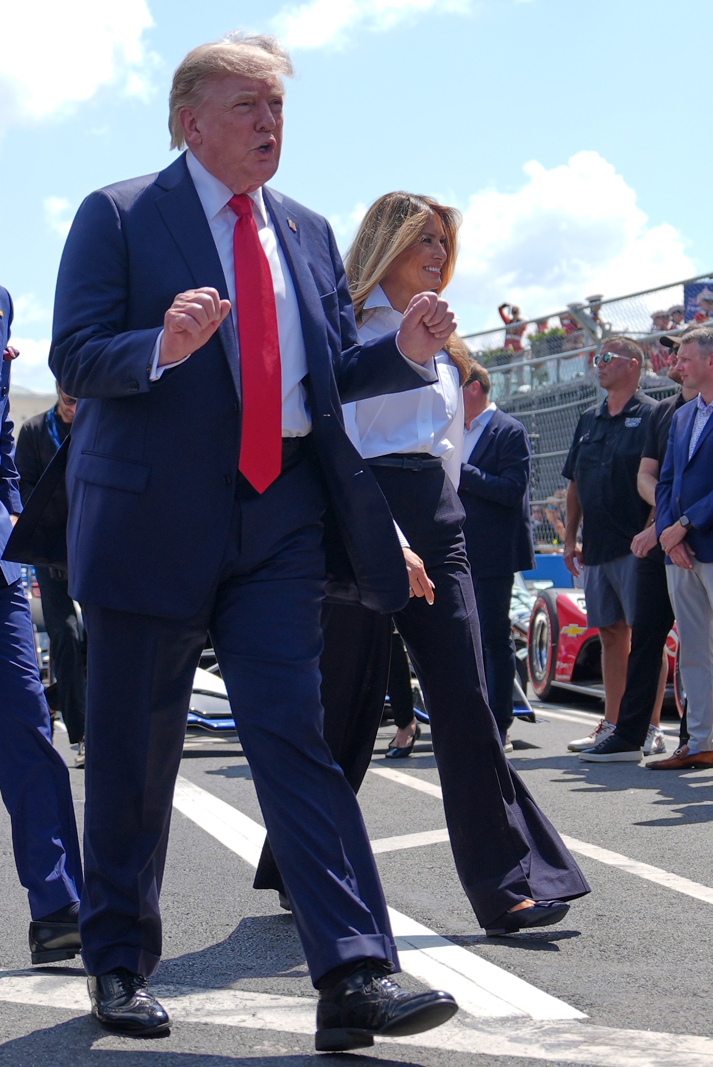 President Donald Trump, left, and first lady Melania Trump attend the IndyCar Freedom 250 Grand Prix auto race, Sunday, Aug. 23, 2026, in Washington. (AP Photo/Julia Demaree Nikhinson)