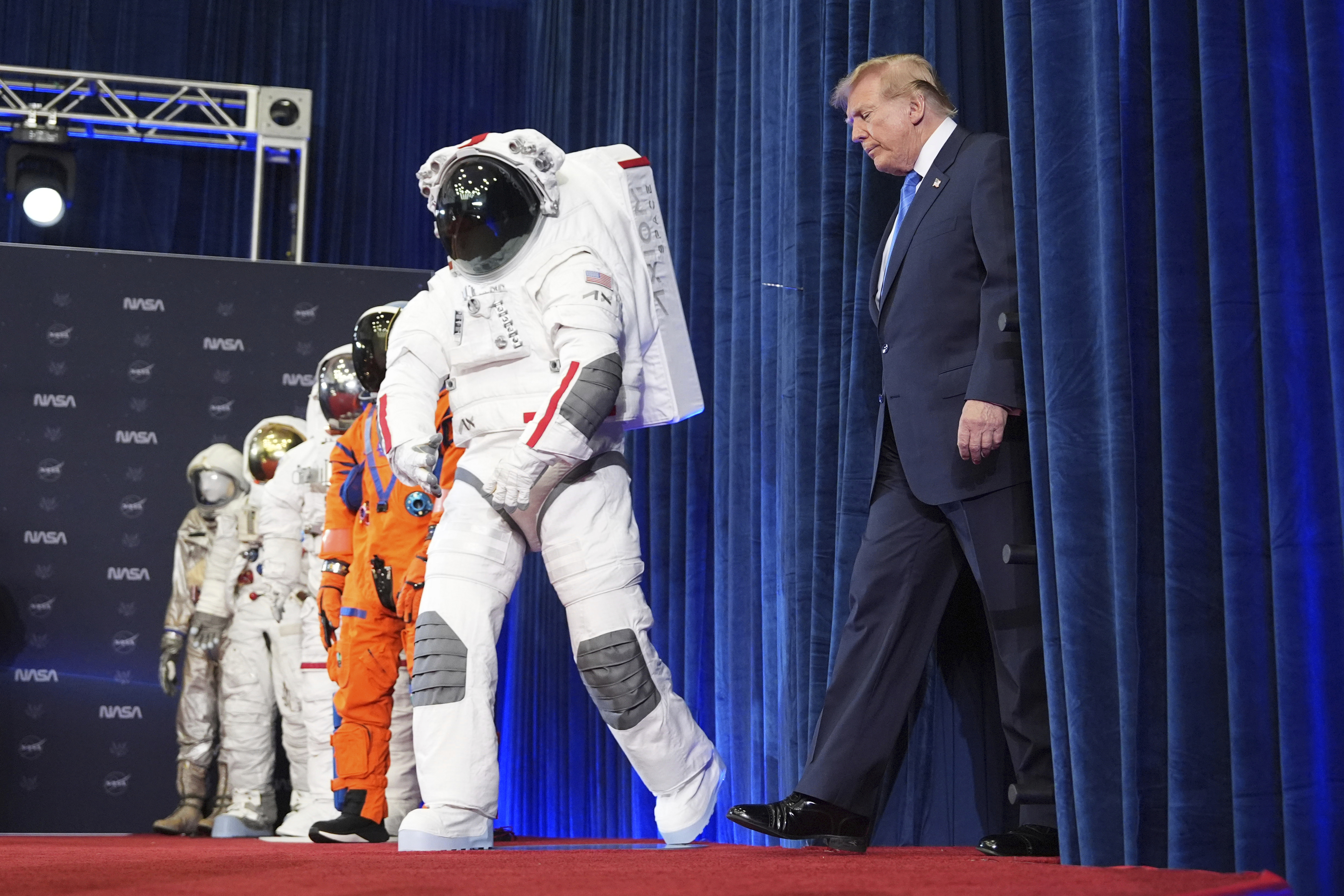 President Donald Trump arrives at an event to present the Congressional Space Medal of Honor to Artemis II crew members, Friday, Aug. 28, 2026, at Johnson Space Center in Houston. (AP Photo/Mark Schiefelbein)