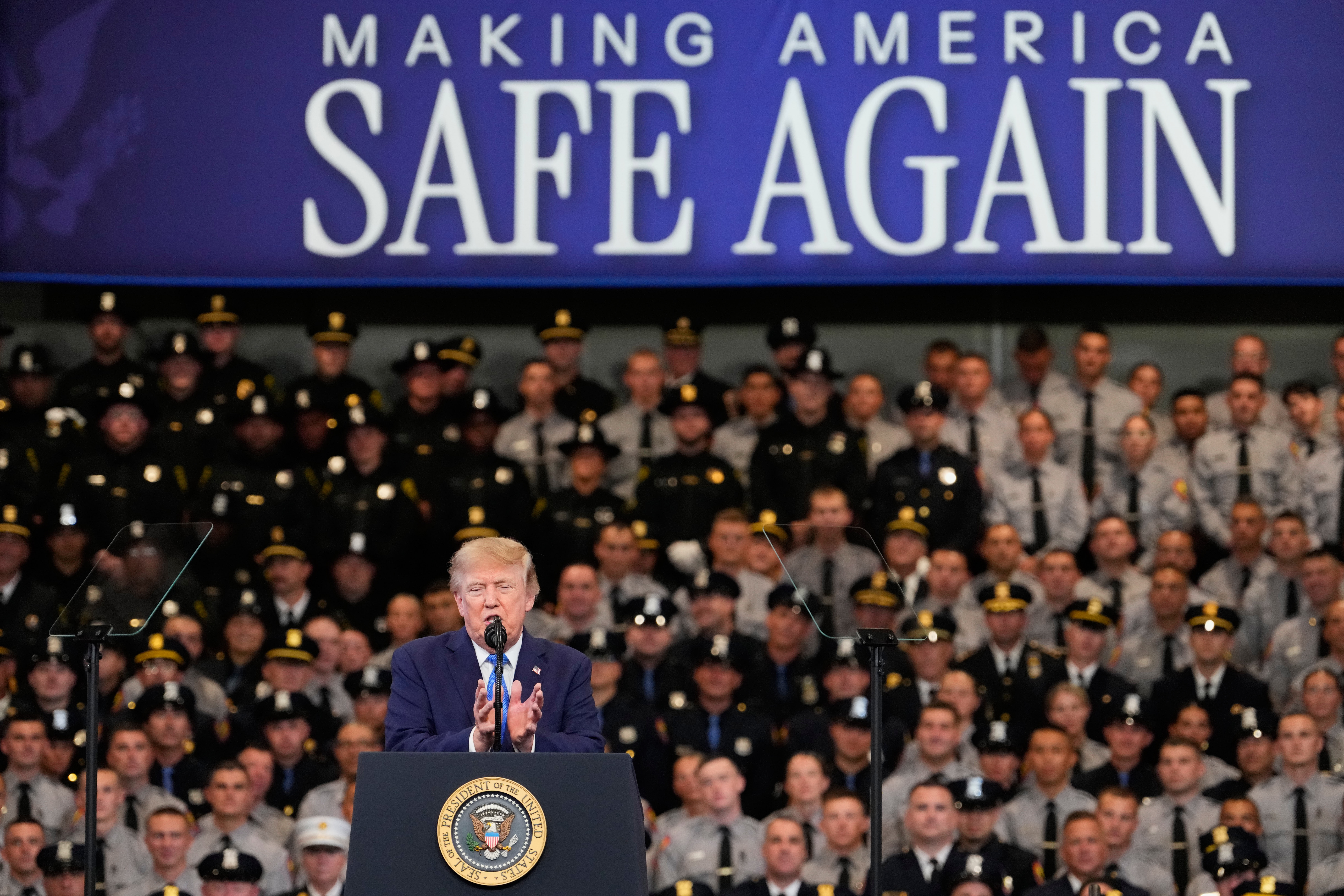 President Donald Trump speaks at the David Mack Center for Training and Intelligence, Friday, Aug. 14, 2026, in Garden City, N.Y. (AP Photo/Yuki Iwamura)