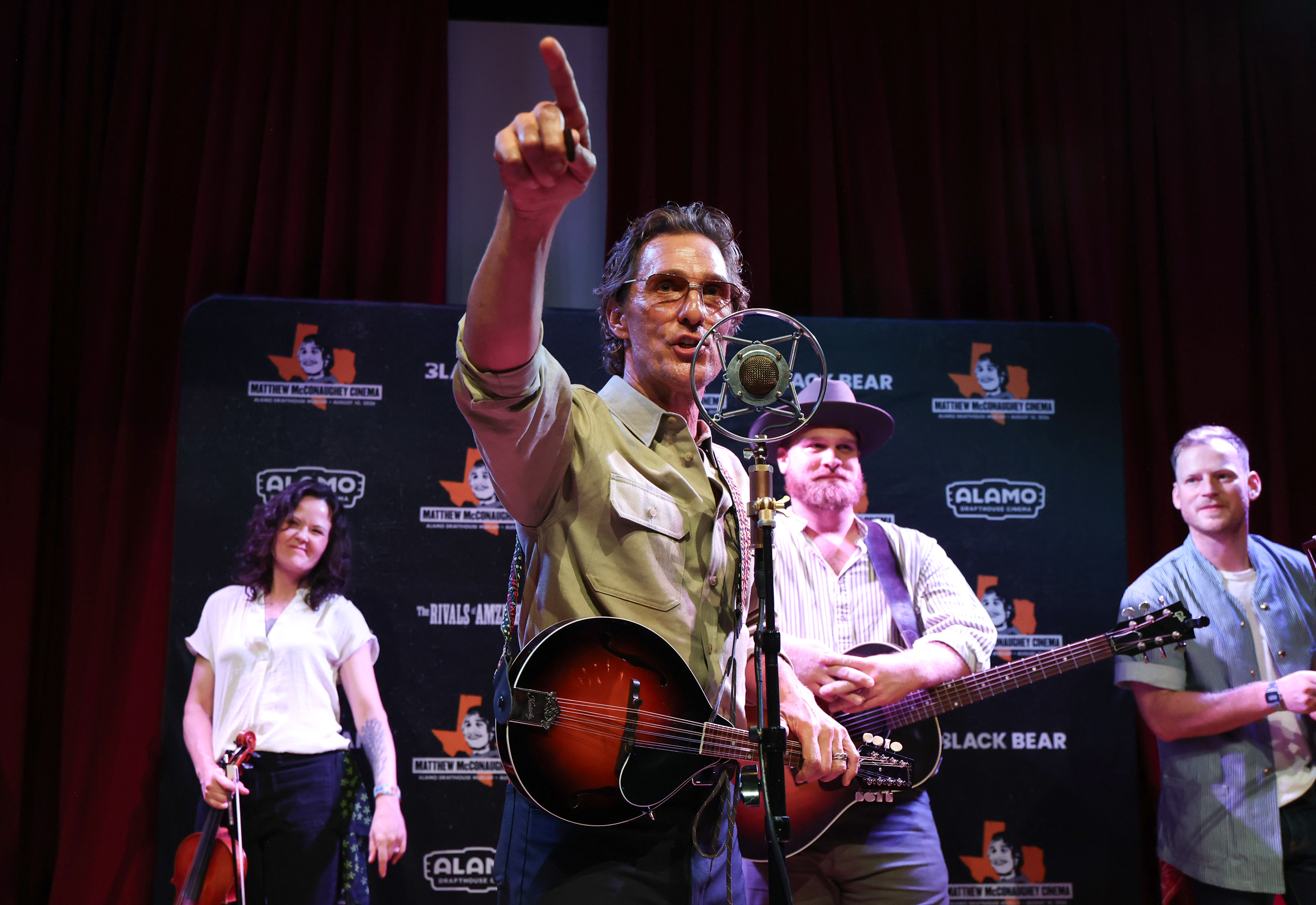 AUSTIN, TEXAS - AUGUST 10: Matthew McConaughey performs onstage during Matthew McConaughey Cinema's dedication ceremony and