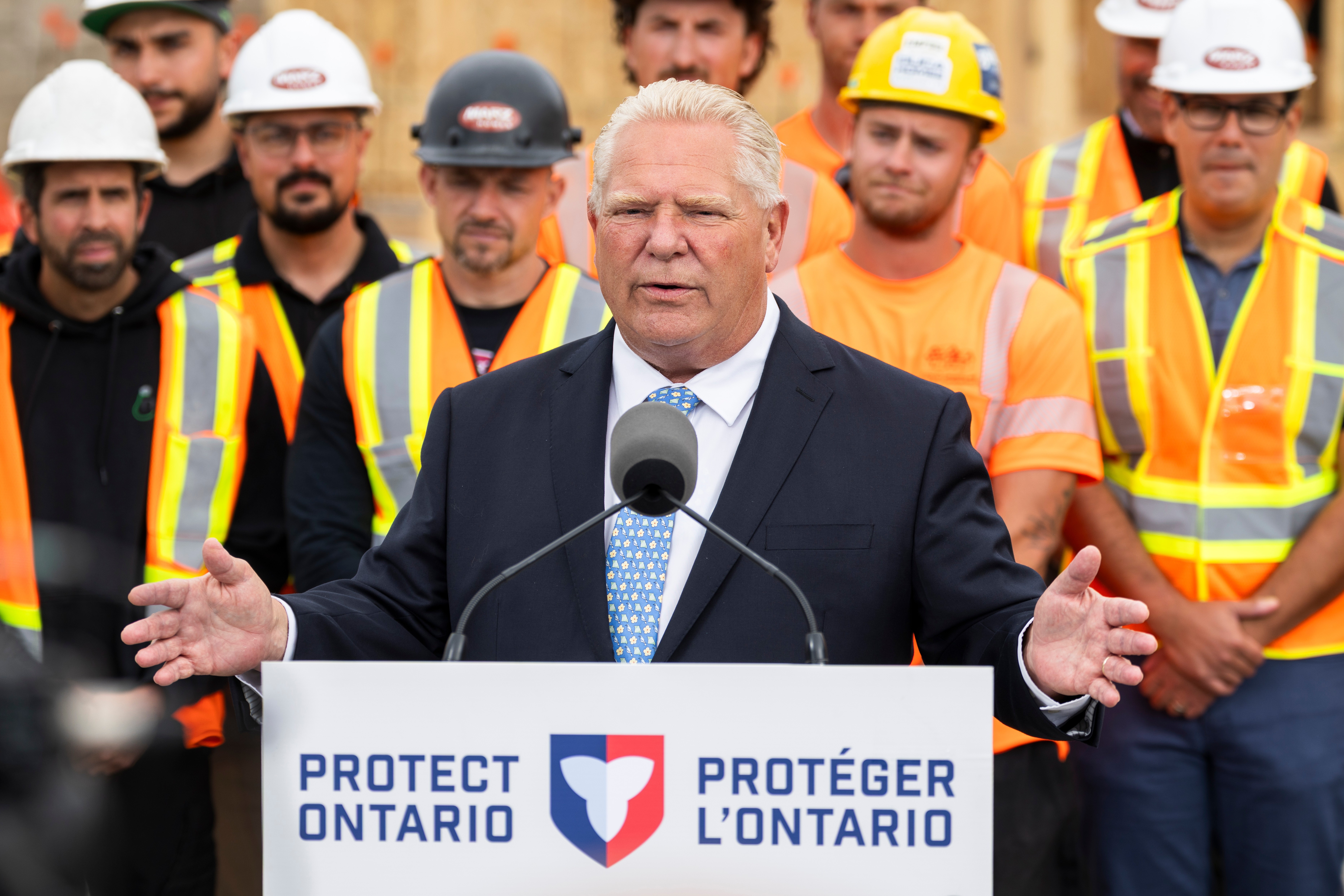 Ontario Premier Doug Ford speaks to media at a housing development in Hamilton, Ontario, Canada, on Monday, Aug. 24, 2026. (Nick Iwanyshyn/The Canadian Press via AP)
