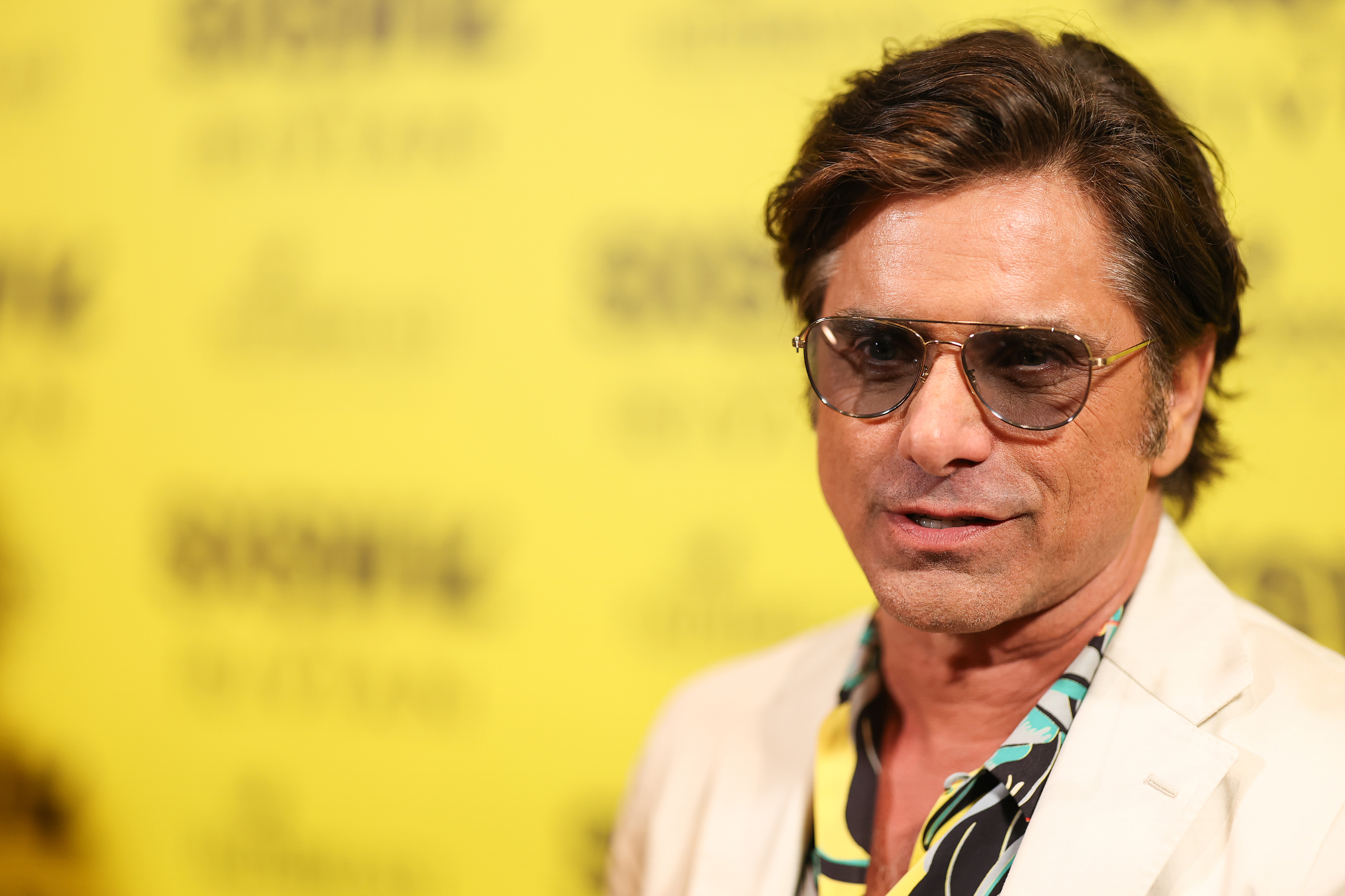AUSTIN, TEXAS - MARCH 13: John Stamos arrives at the