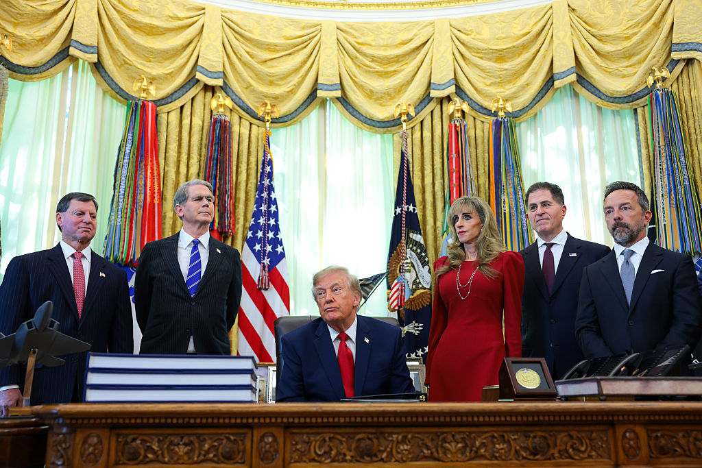 WASHINGTON, DC - OCTOBER 07: (L-R) Social Security Administration Commissioner Frank Bisignano, U.S. Treasury Secretary Scott Bessent, U.S. President Donald Trump, Dell Technologies CEO Michael Dell and his wife Susan Dell, and Altimeter Capital CEO Brad Gerstner look on during an event in the Oval Office of the White House on October 07, 2026 in Washington, DC. President Trump announced that automatic enrollment in the $1,000 government seed deposit for children born between 2025 and 2028 known as