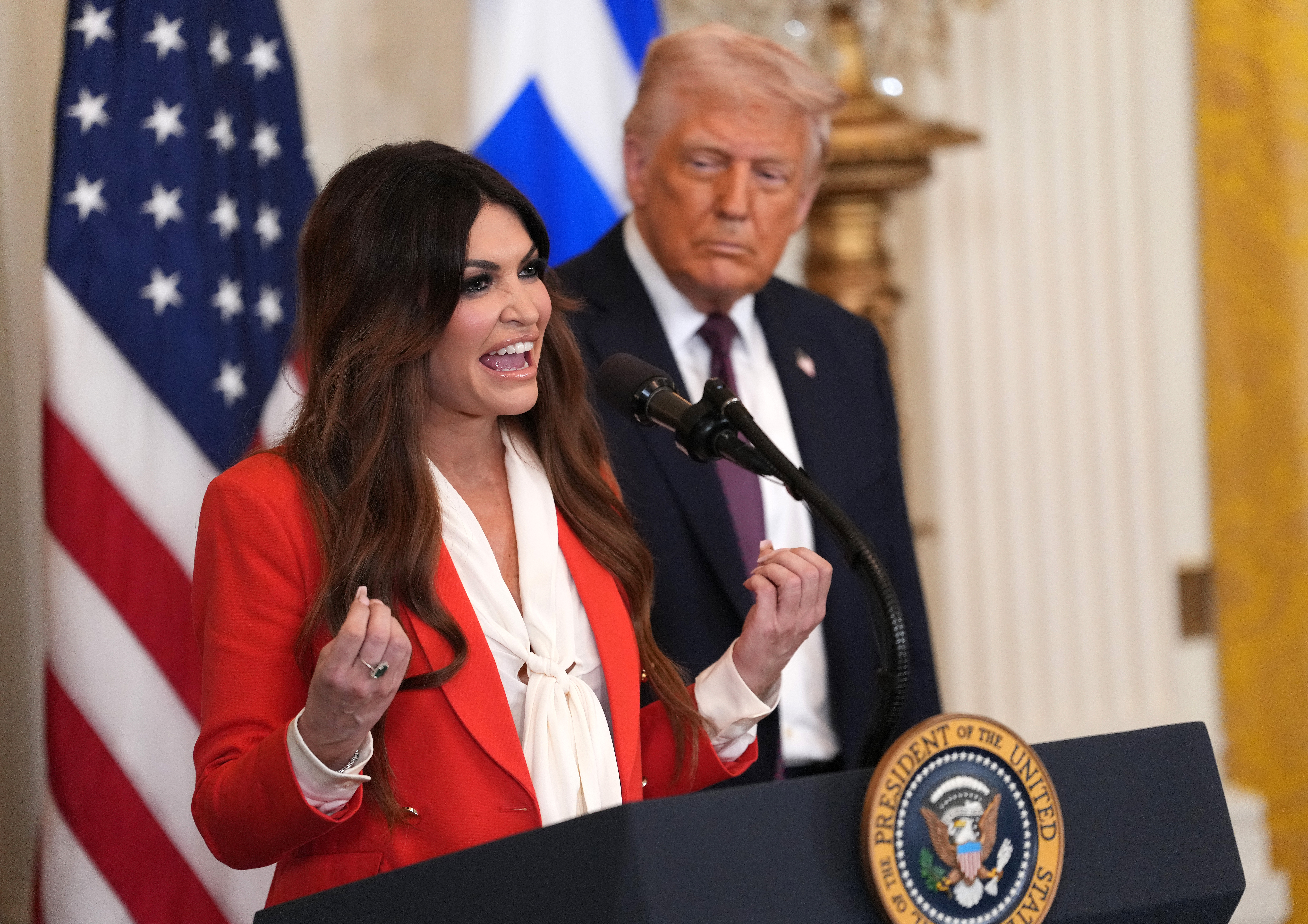 WASHINGTON, DC - MARCH 24: Kimberly Guilfoyle, President Trump's nominee to be the U.S. ambassador to Greece, speaks alongside U.S. President Donald Trump during a Greek Independence Day celebration at the White House on March 24, 2025 in Washington, DC. Trump recognized Greek members of his staff and cabinet and thanked