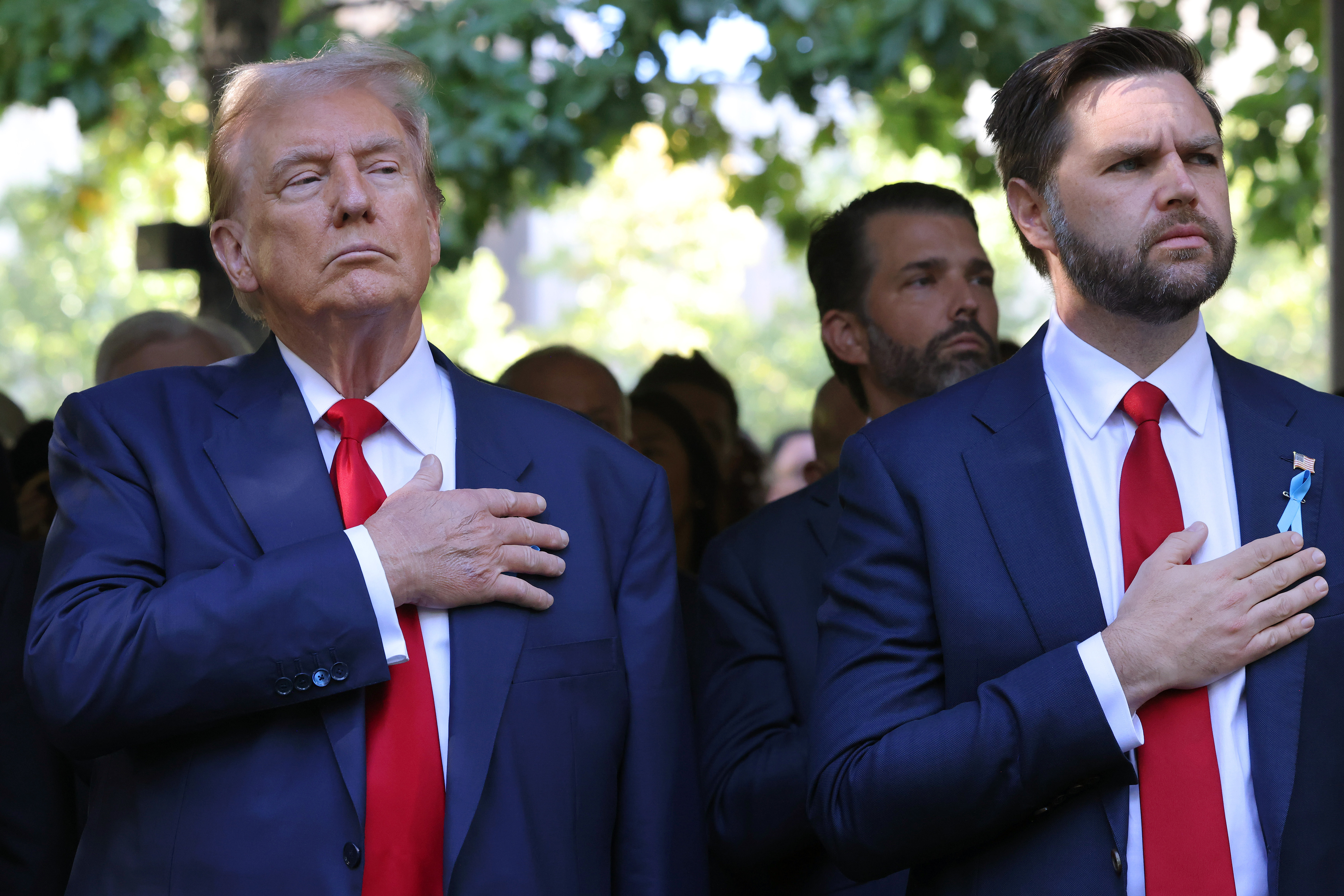 NEW YORK, NEW YORK - SEPTEMBER 11: Former U.S. President Donald Trump and Republican vice presidential nominee, U.S. Sen. J.D. Vance (R-OH) attend the annual 9/11 Commemoration Ceremony at the National 9/11 Memorial and Museum on September 11, 2024 in New York City. U.S. President Joe Biden, Democratic presidential nominee, U.S. Vice President Kamala Harris, Republican presidential nominee, former U.S. President Donald Trump and Republican vice presidential nominee, U.S. Sen. J.D. Vance (R-OH) joined family and friends at Ground Zero honoring the lives of their loved ones on the 23rd anniversary of the terror attacks of September 11, 2001, at the World Trade Center. Biden and Harris will also attend ceremonies at the Flight 93 National Memorial in Shanksville, Pa, and the Pentagon in Arlington, Va., making visits to all three sites of the terror attacks that killed nearly 3,000 people.  (Photo by Michael M. Santiago/Getty Images)