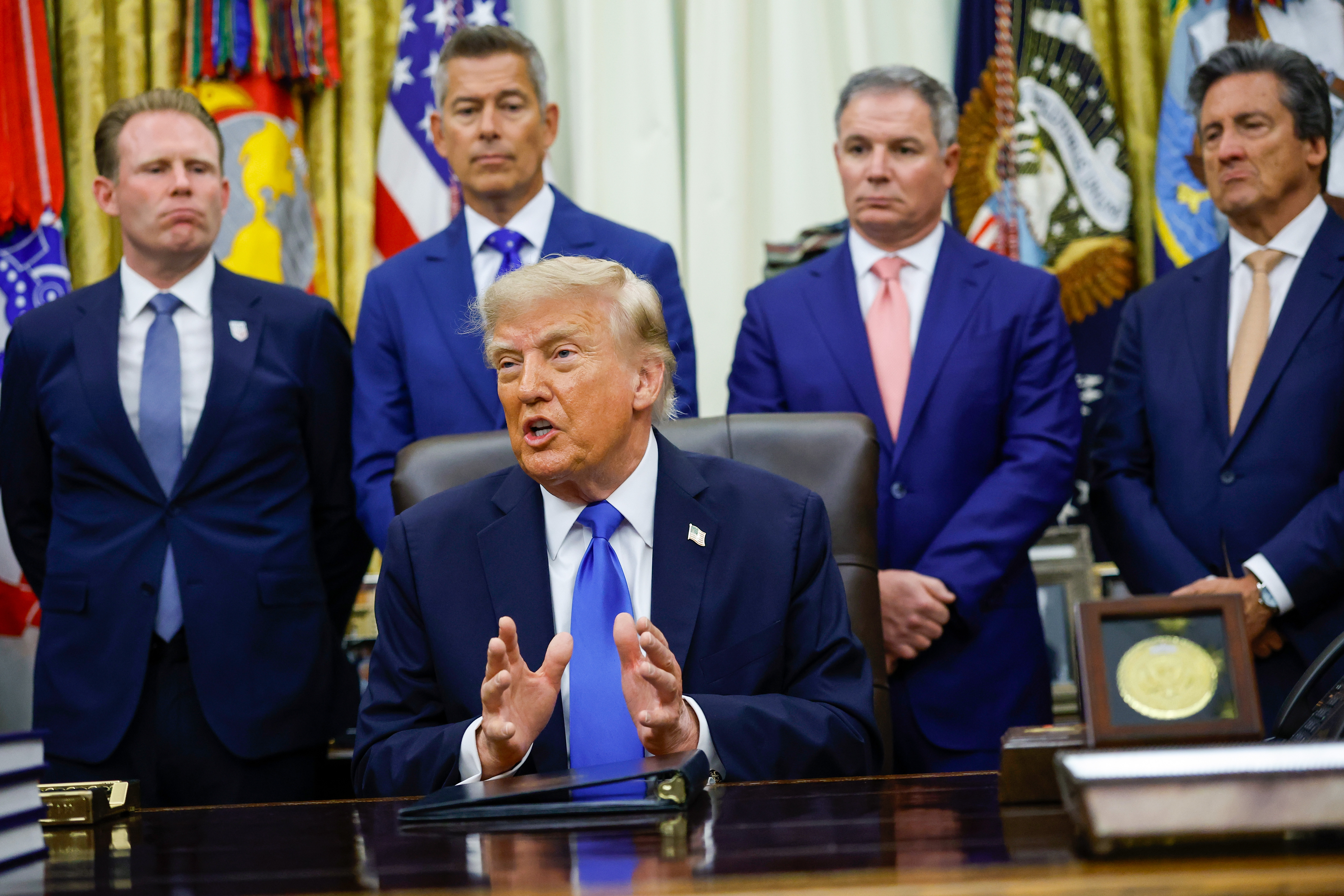 WASHINGTON, DC - SEPTEMBER 02: U.S. President Donald Trump (C) speaks alongside (L-R) Executive Director of the White House Task Force on the FIFA World Cup 2026 Andrew Giuliani, U.S. Transportation Secretary Sean Duffy, President and CEO of U.S. Travel Association Geoff Freeman and CEO of MGM Resorts International William Hornbuckle during a meeting with U.S. travel executives in the Oval Office of the White House on September 02, 2026 in Washington, DC. President Trump met with executives from travel companies including American Airlines, Marriott, MGM Resorts, Carnival, Caesars Entertainment, Hard Rock International, Venetian, and Raffles & Fairmont. (Photo by Kevin Dietsch/Getty Images)