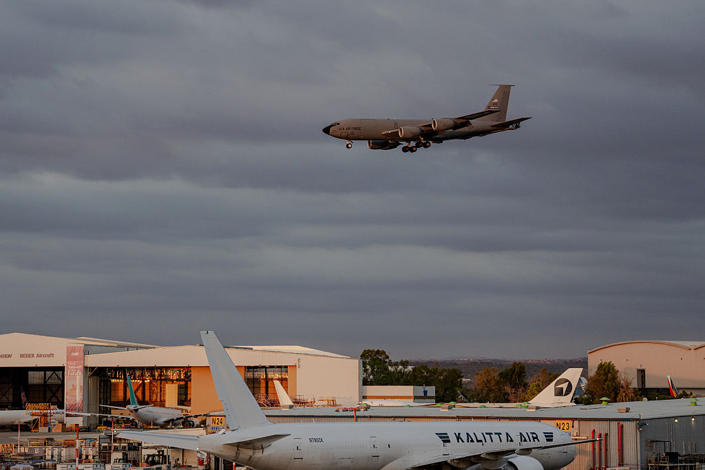 TZAFRIA, ISRAEL - SEPTEMBER 30: A US Air Force KC-135 Stratotanker refueling aircraft flies low on final approach to land over airport hangars at Ben Gurion Airport on September 30, 2026 in Tzafria, Israel. Earlier in the day, a Flydubai flight en route from Dubai to Tel Aviv was diverted to Saudi Arabia following a violent cockpit struggle where passengers reported a pilot was stabbed. A second retrieval aircraft was deployed to collect the stranded passengers and fly them home to Israel. (Photo by Erik Marmor/Getty Images)