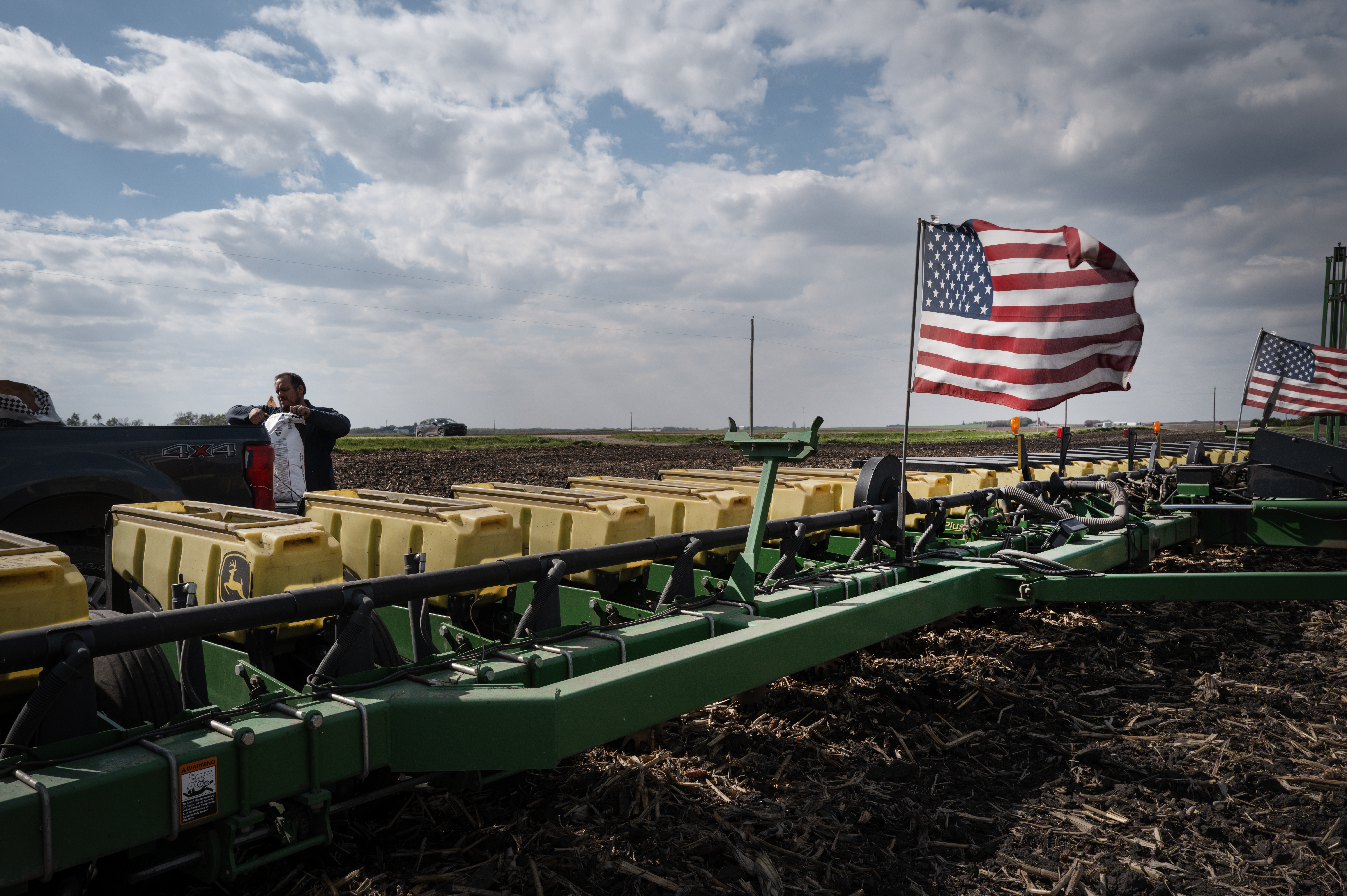 WEST BEND, IOWA - MAY 06: Alan Montag loads soybeans into his planter on May 06, 2026 near West Bend, Iowa. As the spring planting season moves into full swing, farmers are facing big spikes in fuel and fertilizers costs overs last spring due to the war with Iran. (Photo by Scott Olson/Getty Images)