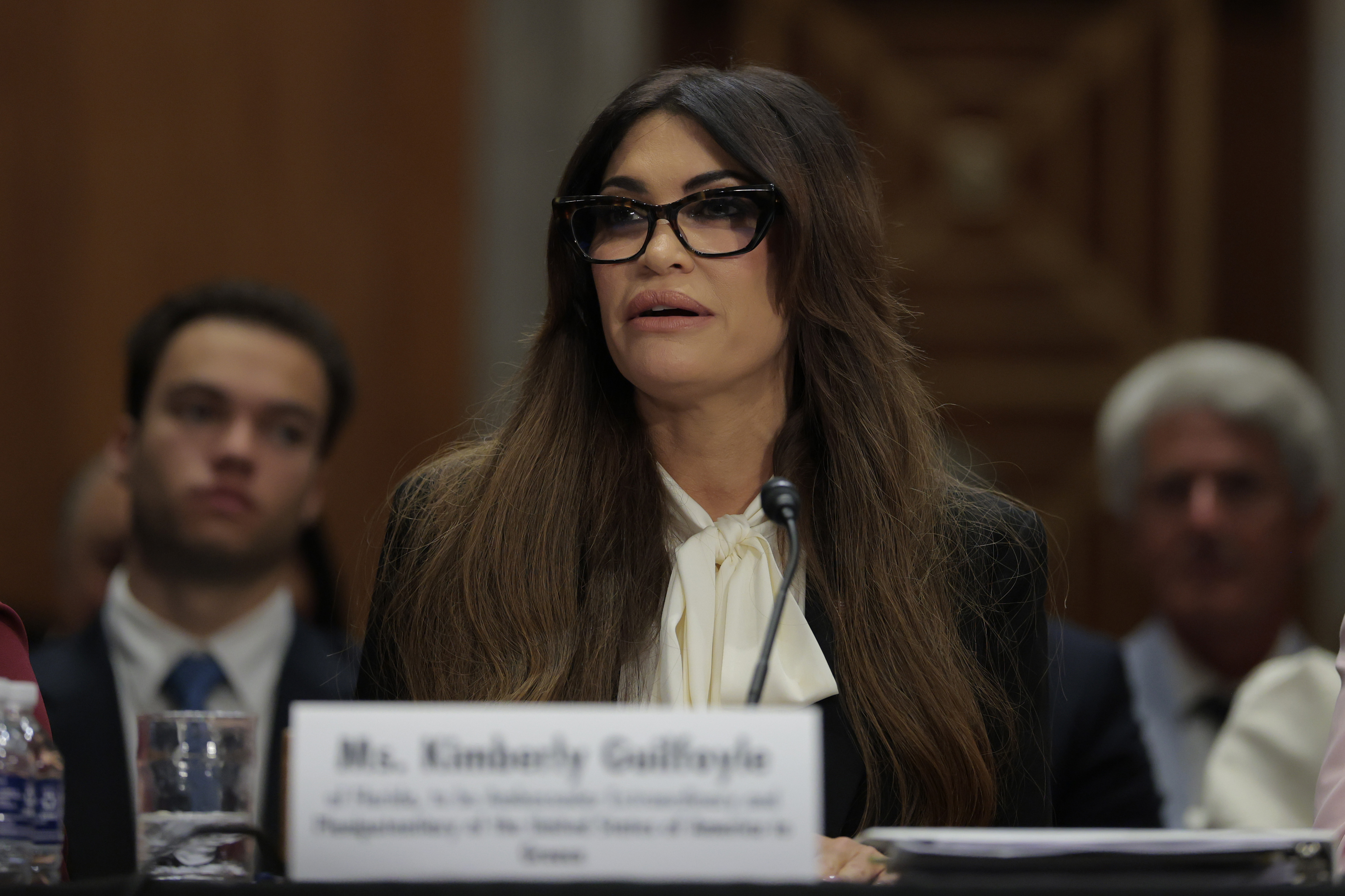 WASHINGTON, DC - JULY 09: Kimberly Guilfoyle, President Trump's nominee to be the U.S. ambassador to Greece, speaks during a nominations hearing with the Senate Foreign Relations Committee on Capitol Hill on July 09, 2025 in Washington, DC. The committee will hear from a series of nominees for United States ambassador and foreign service roles.  (Photo by Anna Moneymaker/Getty Images)