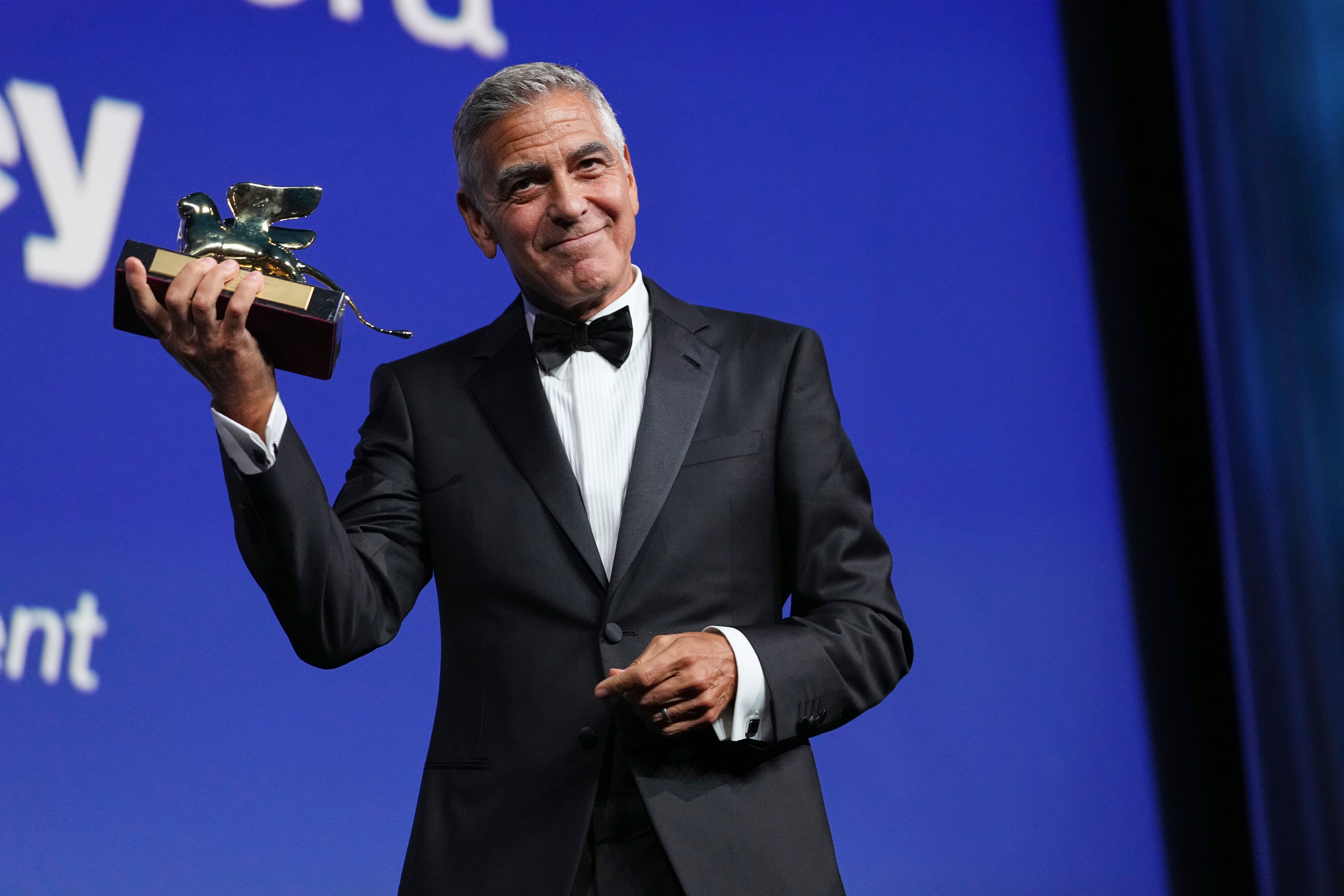 George Clooney poses with the golden lion for lifetime achievement during the opening ceremony of the 83rd edition of the Venice Film Festival in Venice, Italy, on Wednesday, Sept. 2, 2026. (Photo by Scott A Garfitt/Invision/AP)