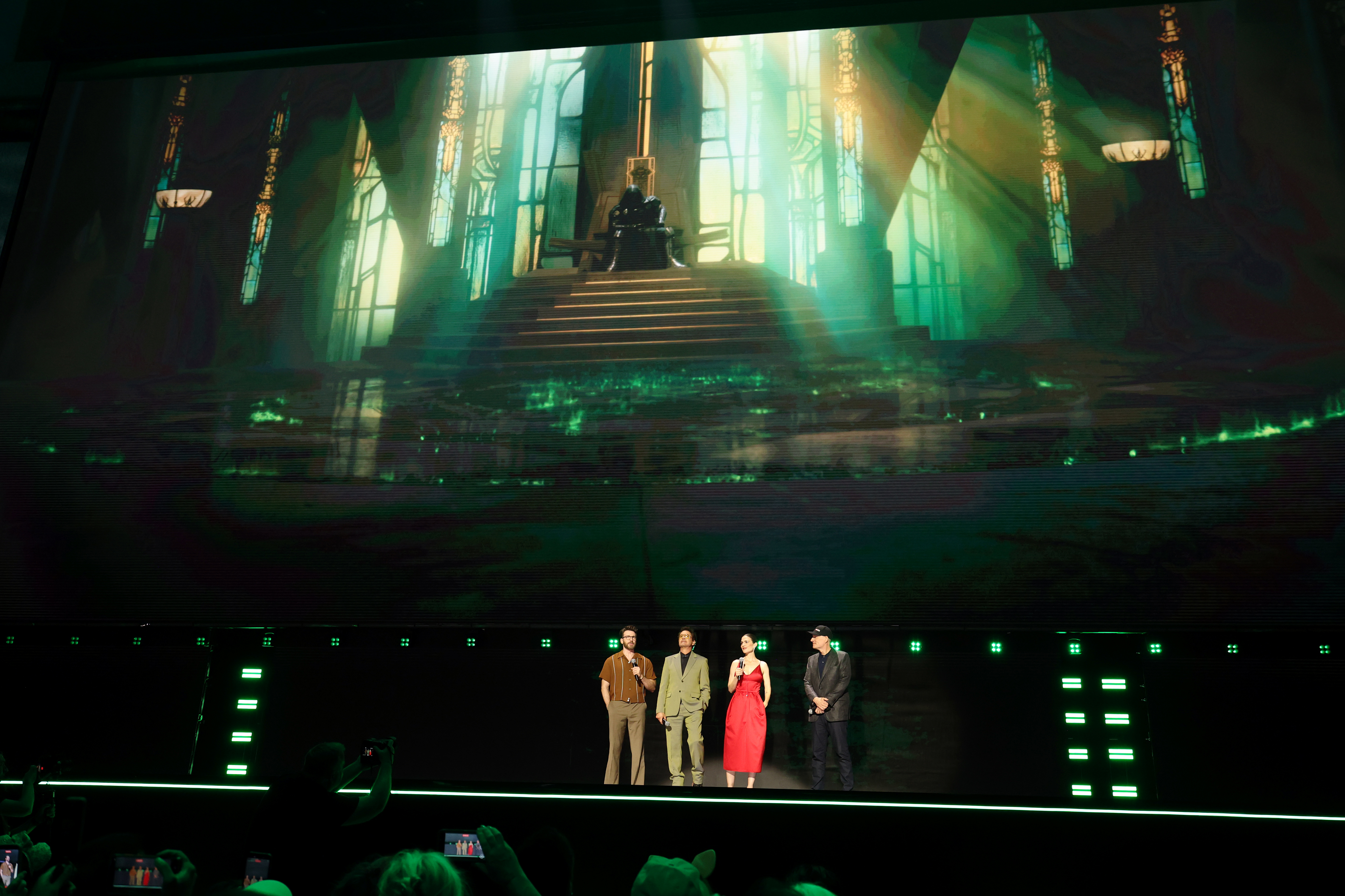 Chris Evans, Robert Downey Jr., Hayley Atwell, and Kevin Feige, President, Marvel Studios, speak onstage at the Disney Entertainment Showcase at D23: The Ultimate Disney Fan Event on August 14, 2026 in Anaheim, California (Kevin Mazur/Getty Images for Disney)