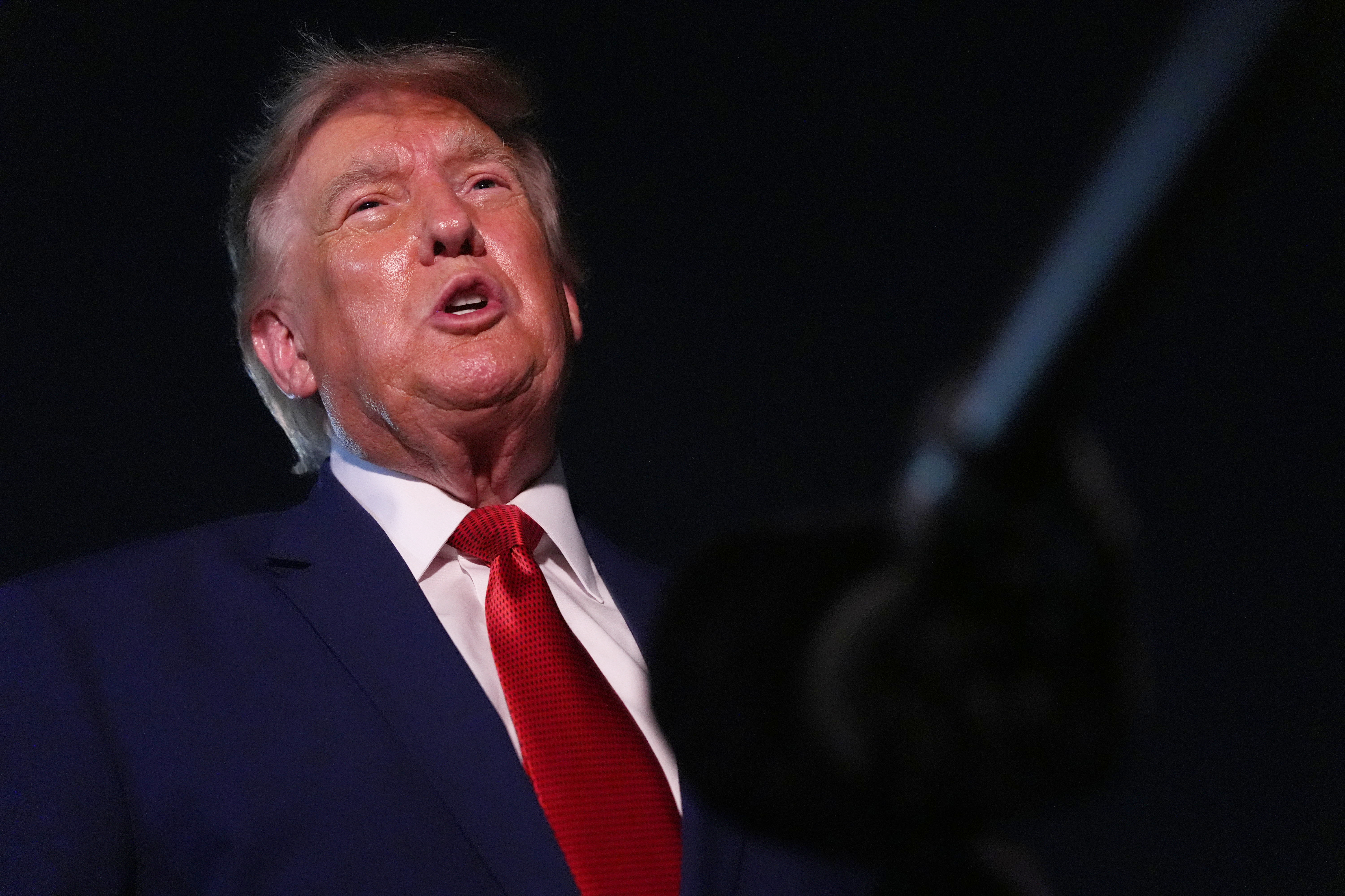 President Donald Trump talks to reporters after arriving on Air Force One Tuesday, Aug. 11, 2026, at Joint Base Andrews, Md. (AP Photo/Mark Schiefelbein)
