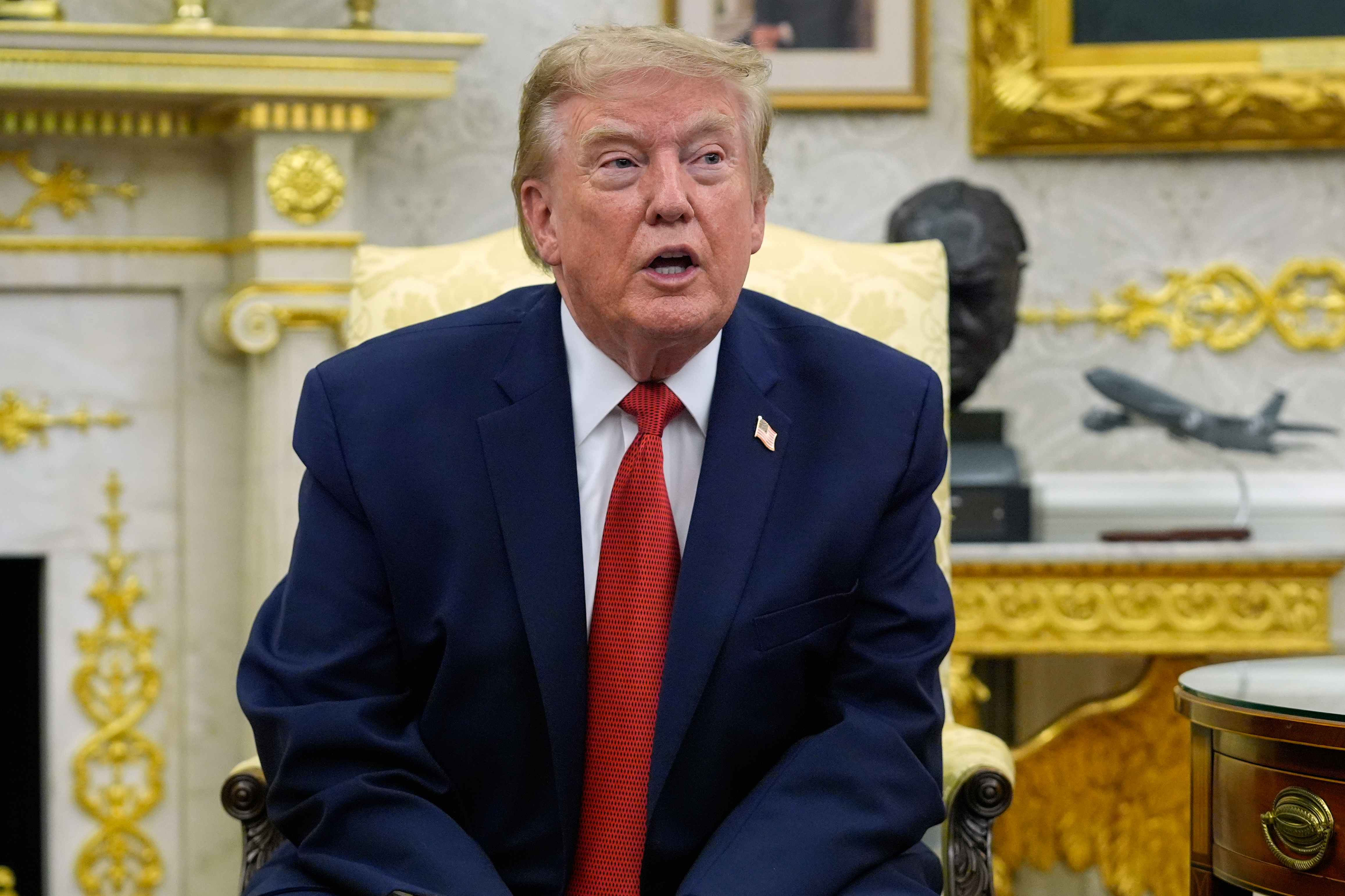 President Donald Trump speaks as he meets with lifeguard Ryder Williams in the Oval Office of the White House, Monday, Aug. 17, 2026, in Washington. (AP Photo/Manuel Balce Ceneta)
