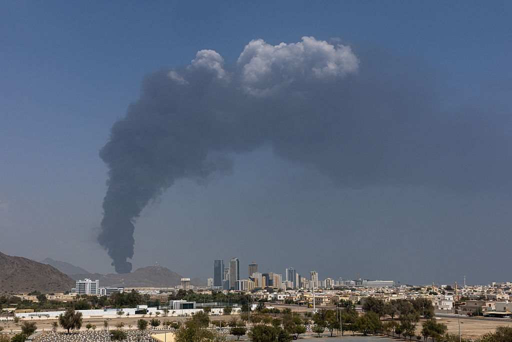 FUJAIRAH, UNITED ARAB EMIRATES - MARCH 05: Smoke rises after an explosion in the industrial zone, caused by debris after interception of a drone by air defence, according to the Fujairah media office on March 05, 2026, in Fujairah, United Arab Emirates. In recent days, Iran has fired drones and missiles toward the UAE and other Gulf states, following the joint U.S.-Israeli attack on Iran that began on February 28. Foreign ministers from the Gulf Co-operation Council (GCC) held an online meeting on March 1 and issued a statement saying they will take