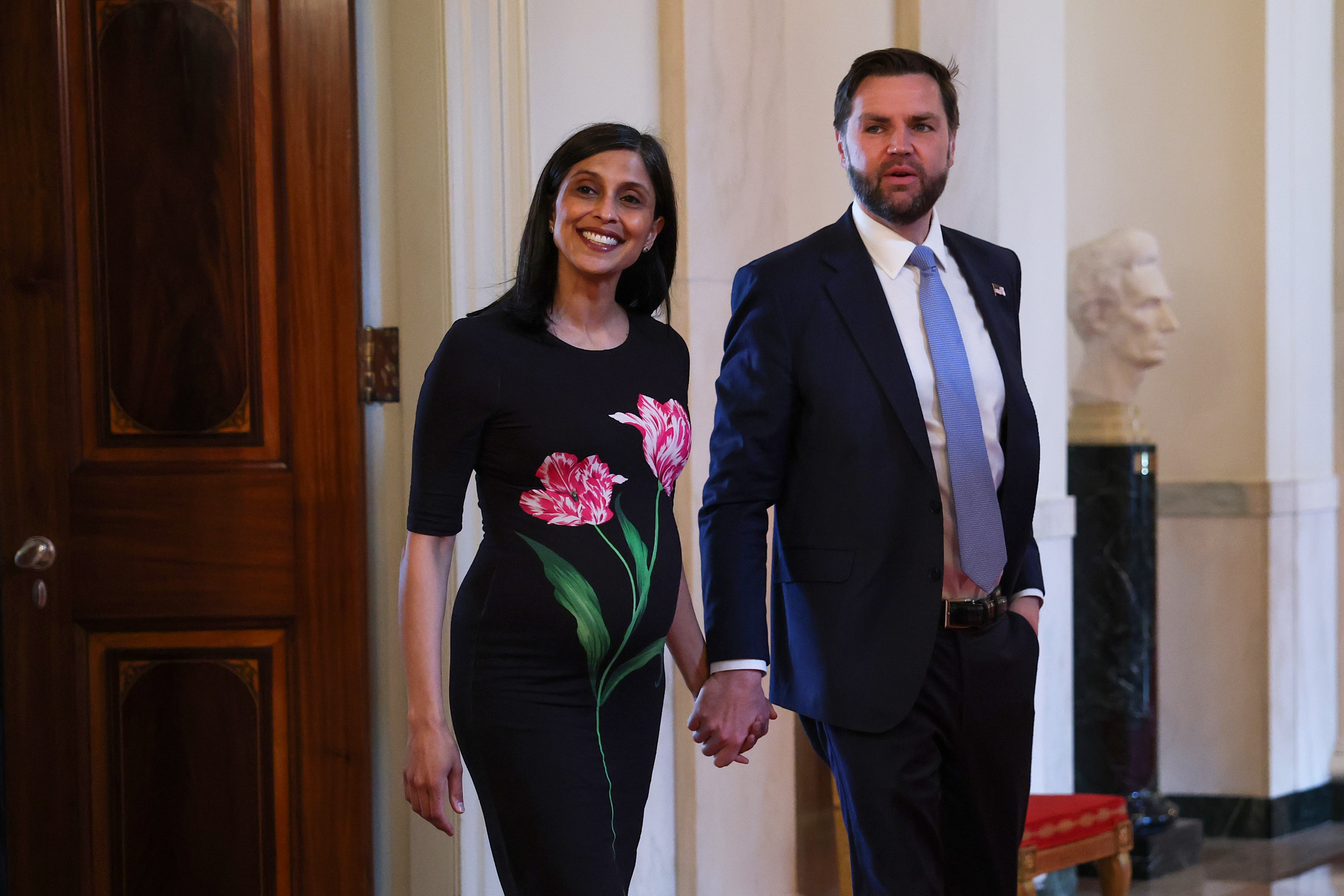 WASHINGTON, DC - MAY 06: Second lady Usha Vance and U.S. Vice President JD Vance arrive for a military mothers celebration in the East Room of the White House on May 6, 2026 in Washington, DC. President Trump and the first lady honored America's military mothers at the event ahead of Mother's Day.  (Photo by Anna Moneymaker/Getty Images)