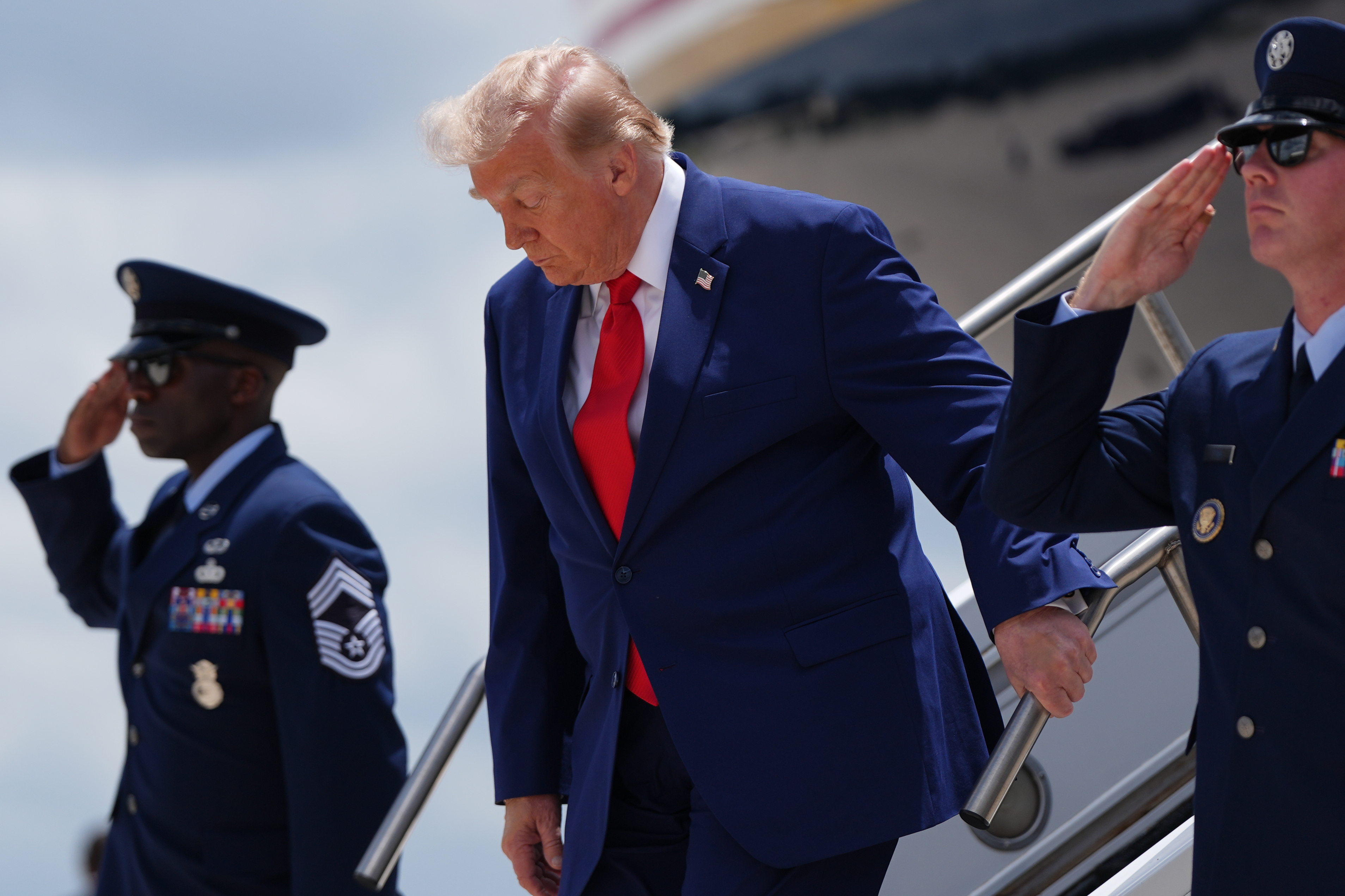 President Donald Trump disembarks Air Force One at Dobbins Air Reserve Base, Wednesday, July 22, 2026, in Marietta, Ga. (AP Photo/Julia Demaree Nikhinson)