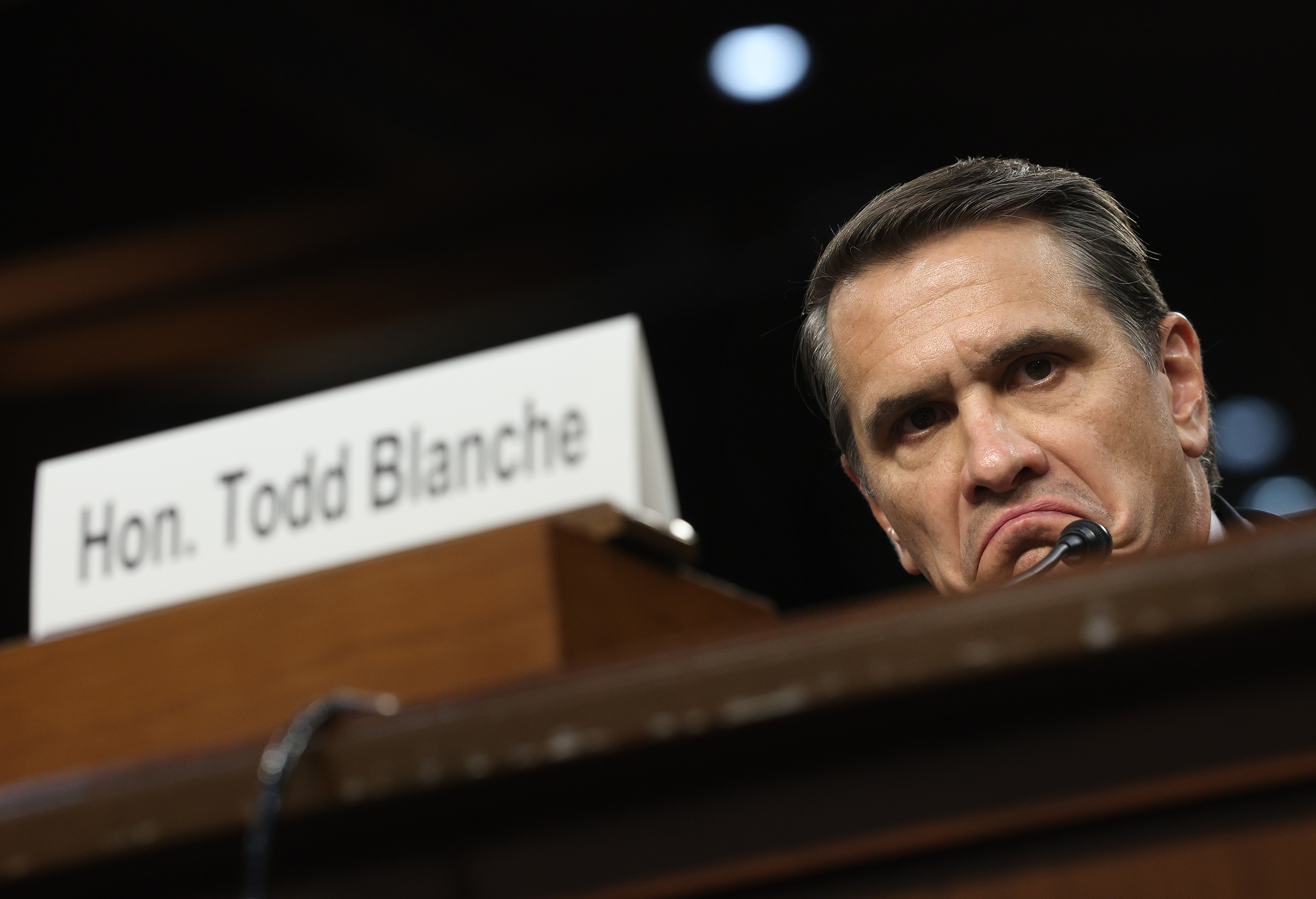 WASHINGTON, DC - JULY 15: Acting Attorney General Todd Blanche appears at his confirmation hearing in front of the Senate Judiciary Committee on Capitol Hill July 15, 2026 in Washington, DC.  During Blanche's tenure as acting Attorney General the Justice Department has been under scrutiny for pushing President Trump's 1.8 billion dollar
