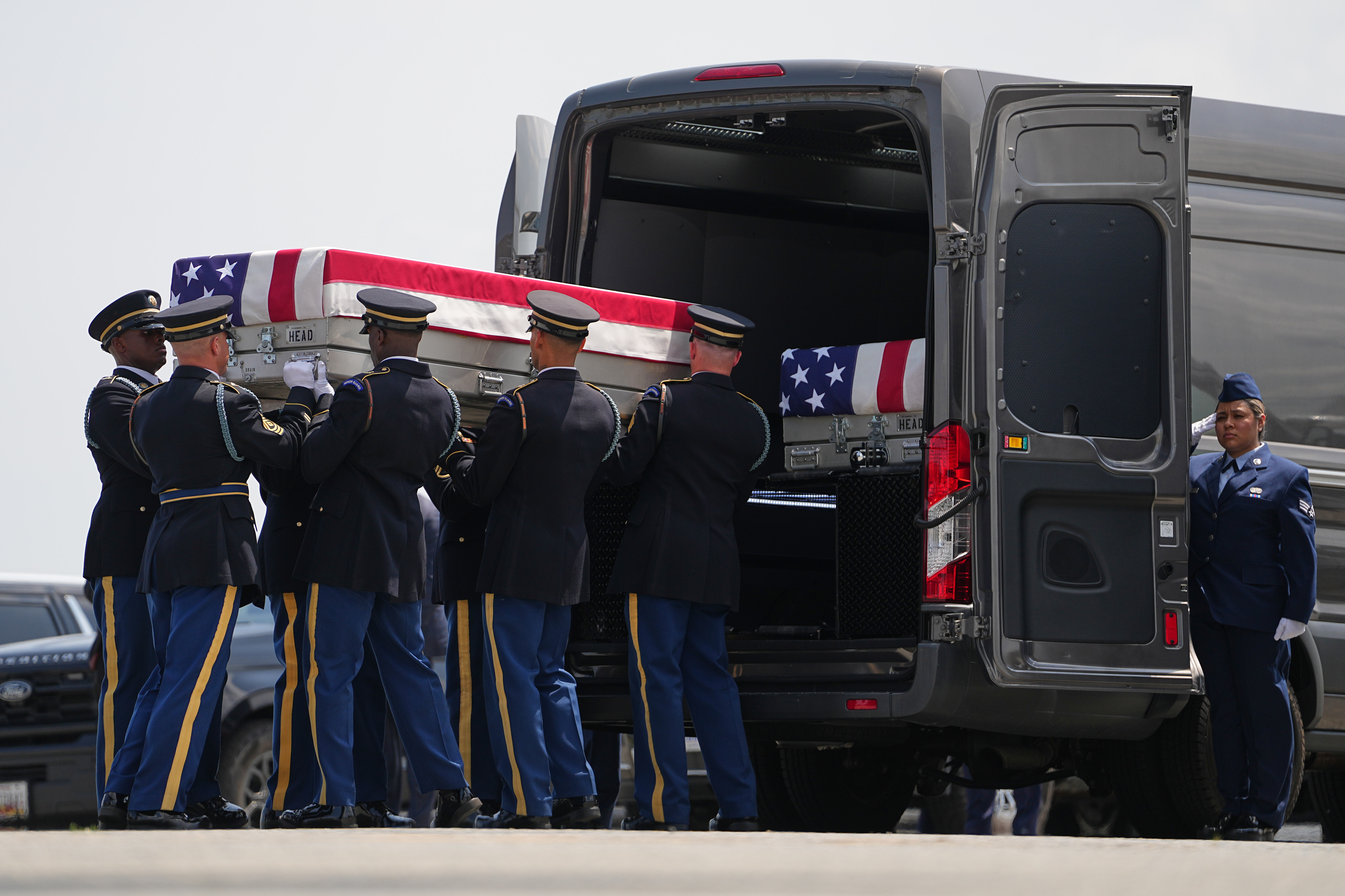A U.S. Army carry team places a transfer case containing the remains of Pvt. Isabella Gonzales of Carrollton, Texas, into a transfer vehicle, Wednesday, July 22, 2026, at Dover Air Force Base, Del. (AP Photo/Matt Rourke)