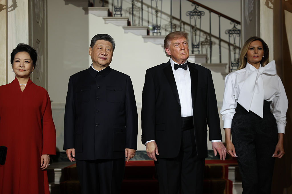 WASHINGTON, DC - SEPTEMBER 24:  U.S. President Donald Trump and first lady Melania Trump stand with Chinese President Xi Jinping and first lady Peng Liyuan before a state dinner in the East Room of the White House on September 24, 2026 in Washington, DC. Trump is hosting Xi for a three-day state visit to Washington, DC, where the leaders were expected to discuss trade practices, artificial intelligence and the furthering&nbsp;of