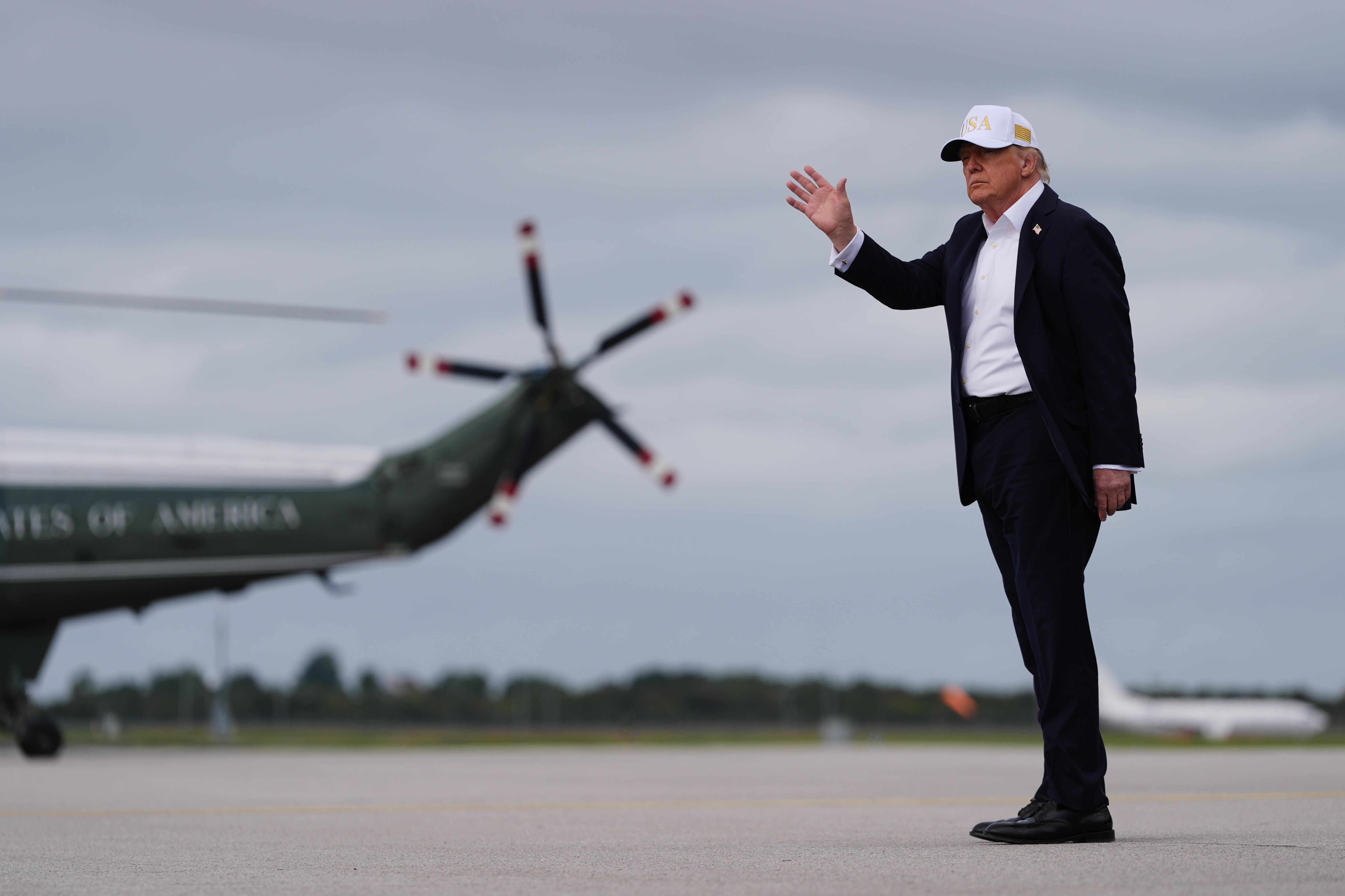President Donald Trump waves after disembarking Air Force One on arrival at Shannon Airport in Shannon, Ireland, Saturday, Sept 12, 2026 (AP Photo/Julia Demaree Nikhinson)