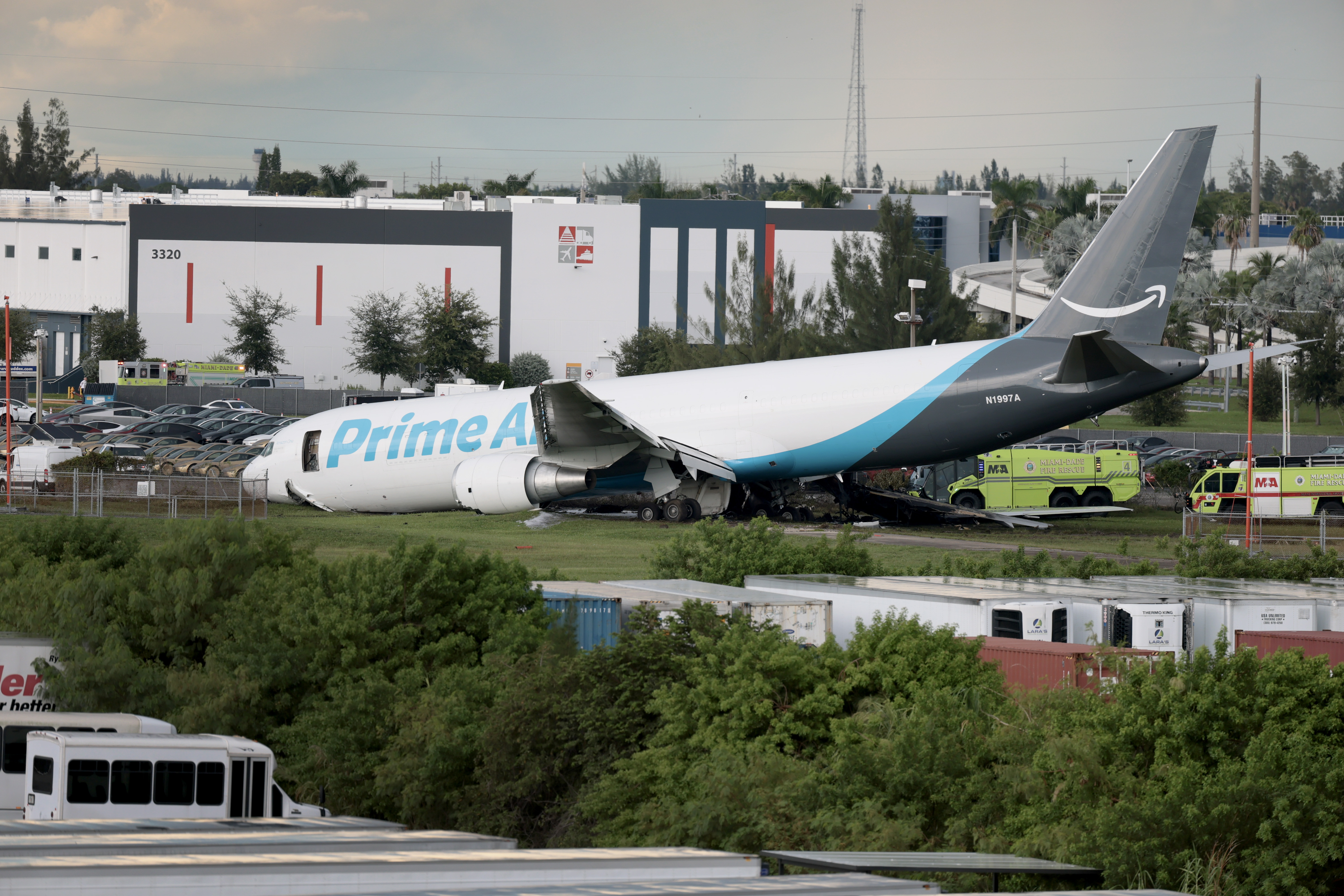 An Amazon cargo plane is seen after it crashed at Miami International Airport on September 06, 2026 in Miami, Florida. In a statement, the Federal Aviation Administration said Prime Air Flight 7598...