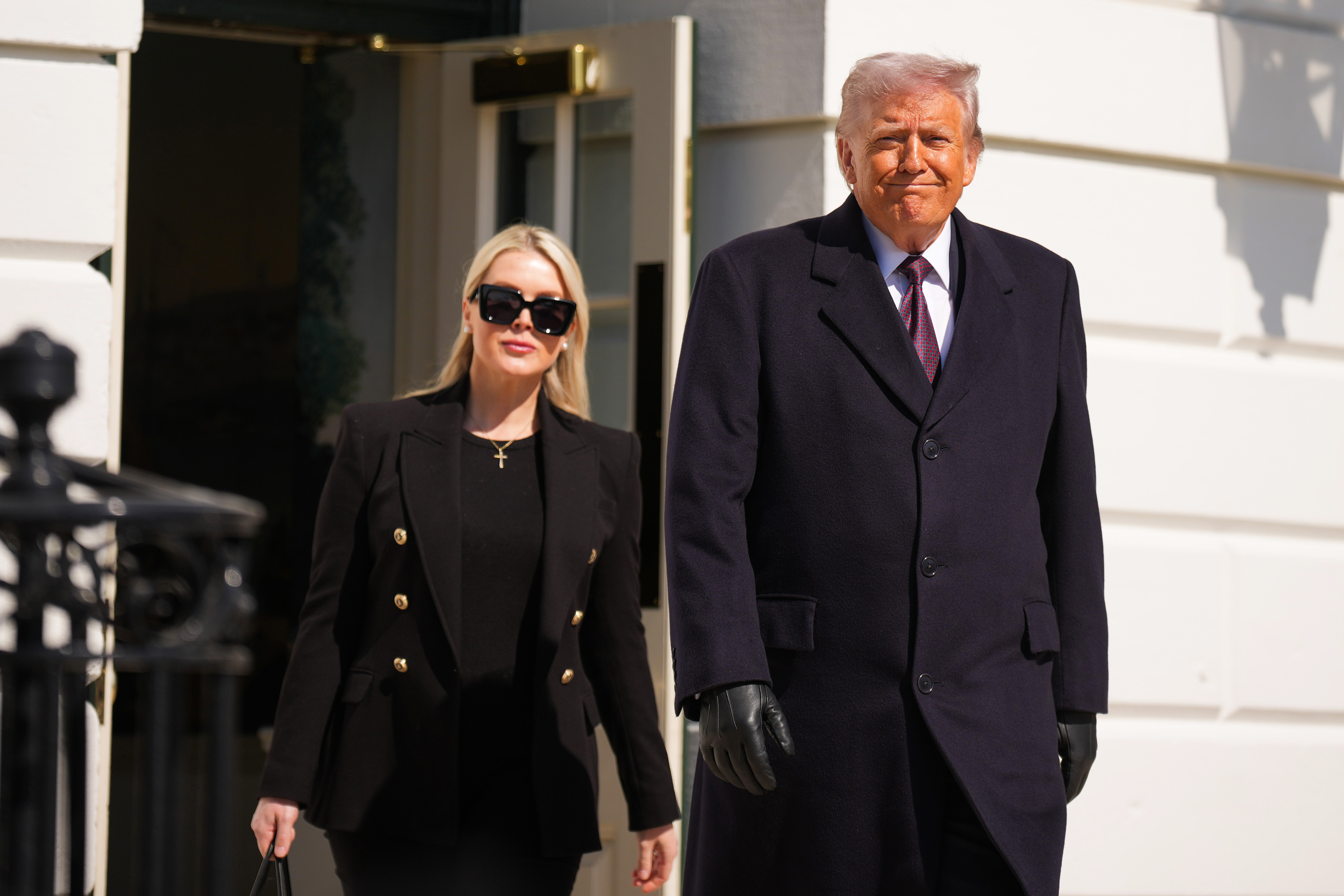 WASHINGTON, DC - FEBRUARY 27: U.S. President Donald Trump departs the White House alongside White House Press Secretary Karoline Leavitt (L) and boards Marine One on the South Lawn on February 27, 2026 in Washington, DC. Trump will deliver remarks in Corpus Christi, Texas before traveling to Florida to spend the weekend at his Mar-a-Lago resort. (Photo by Andrew Harnik/Getty Images)