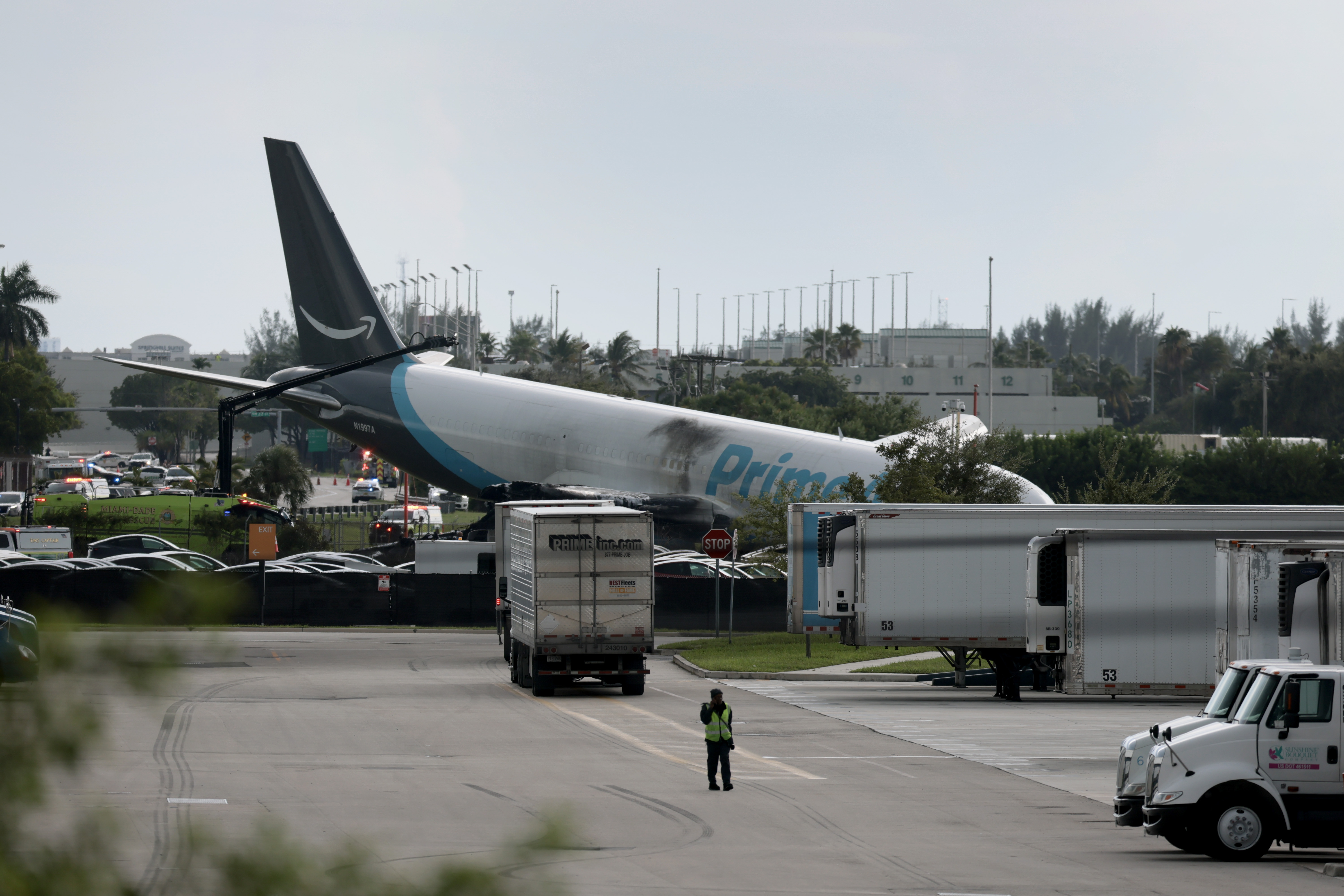 MIAMI, FLORIDA - SEPTEMBER 06:  An Amazon cargo plane is seen after it crashed at Miami International Airport on September 06, 2026 in Miami, Florida. In a statement, the Federal Aviation Administration said Prime Air Flight 7598 overran the runway while landing around 2 p.m. after departing from Luis Muñoz Marín International Airport in San Juan, Puerto Rico, earlier today. (Photo by Joe Raedle/Getty Images)