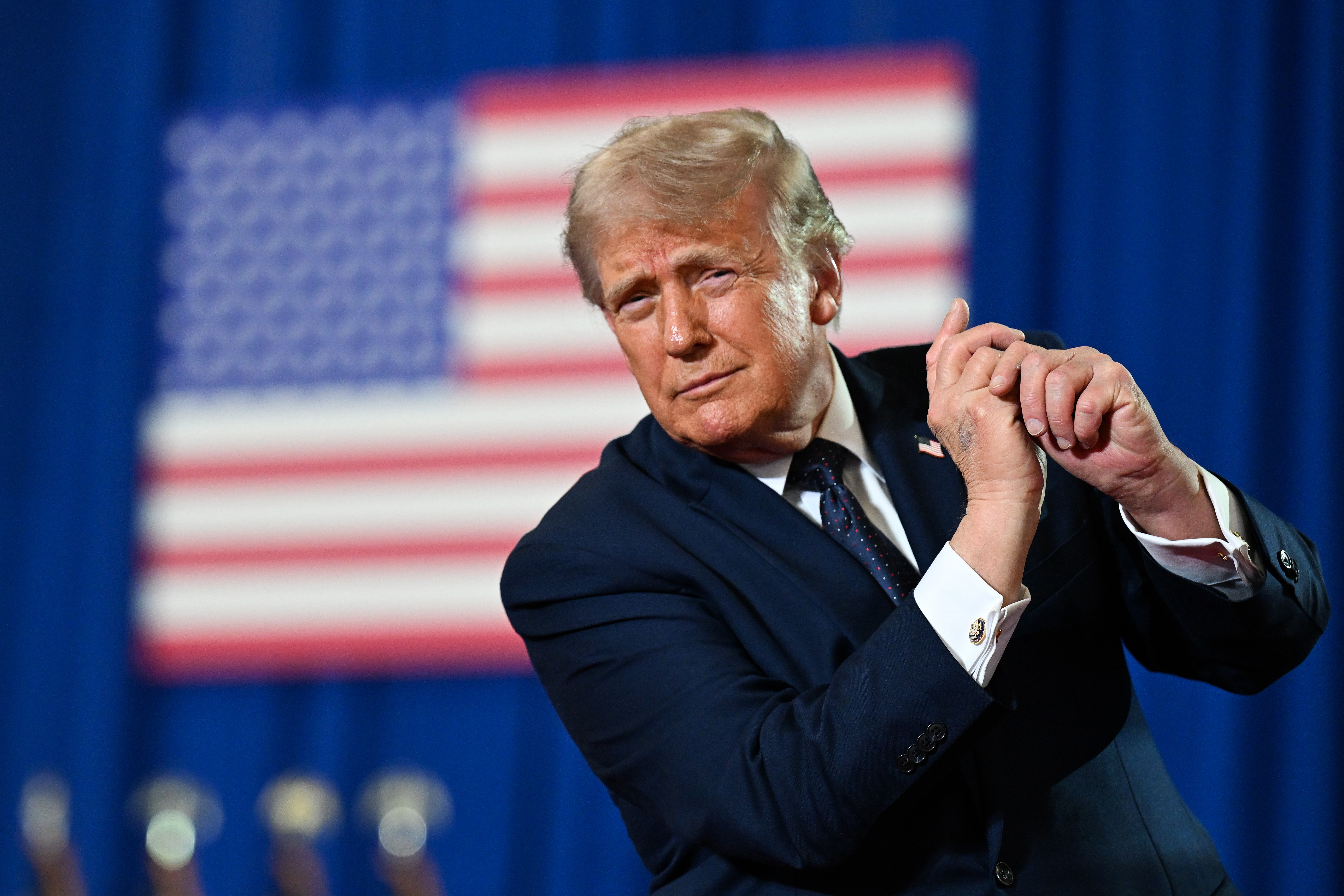 HANOVER, NEW JERSEY - MAY 22: U.S. President Donald Trump waves after landing at Morristown Municipal Airport and prior to boarding Marine One on May 22, 2026 in Hanover, New Jersey. Trump is traveling to the Hudson Valley for a campaign and economic policy event and to support Rep. Mike Lawler (R-NY) as he seeks reelection in what is expected to be one of the nation’s most closely watched House races this November. (Photo by Roberto Schmidt/Getty Images)