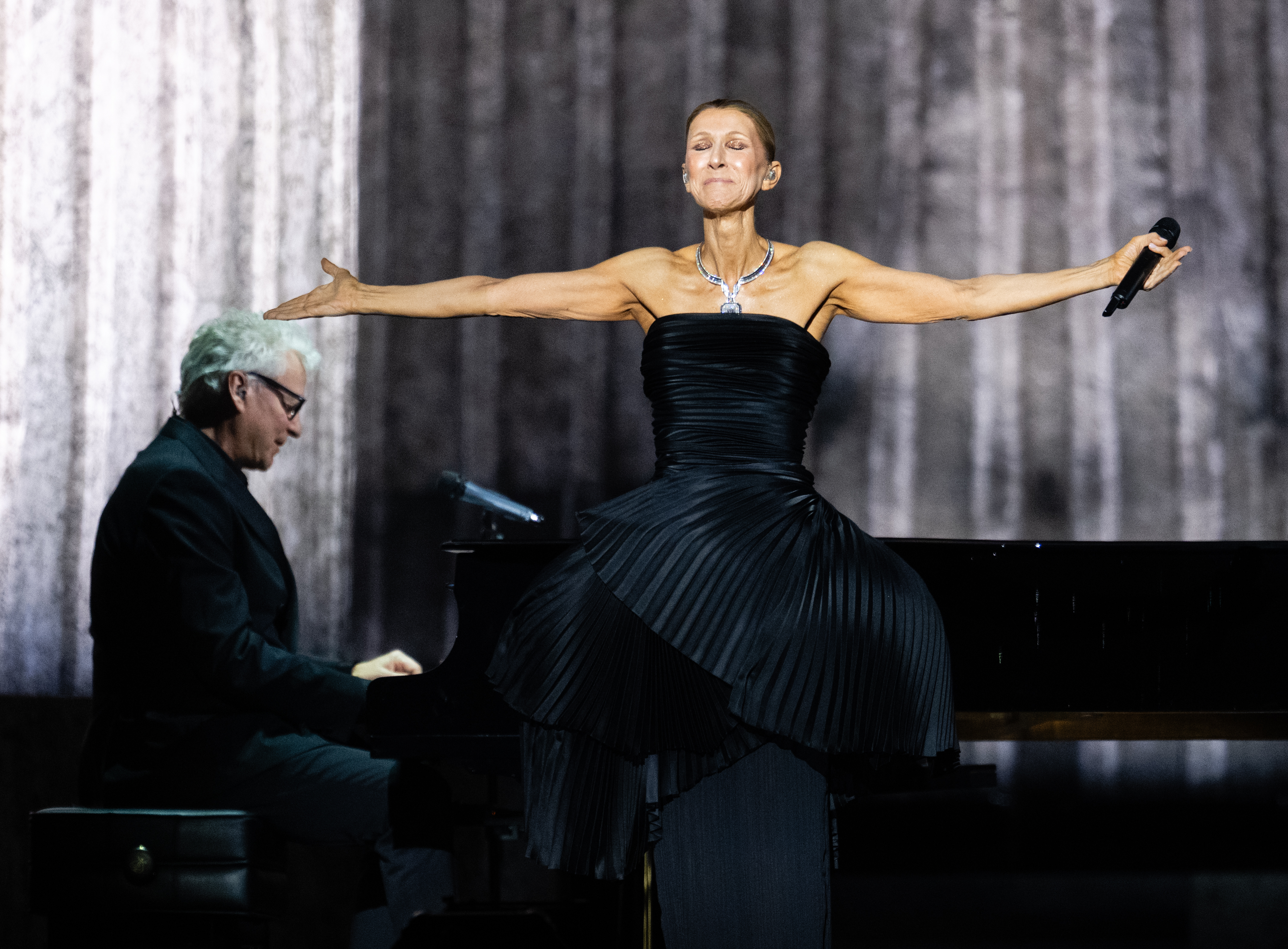 NANTERRE, FRANCE - SEPTEMBER 12:  Celine Dion performs on the opening night of her residency at Paris La Defense Arena on September 12, 2026 in Nanterre, France. (Photo by Samir Hussein/WireImage)