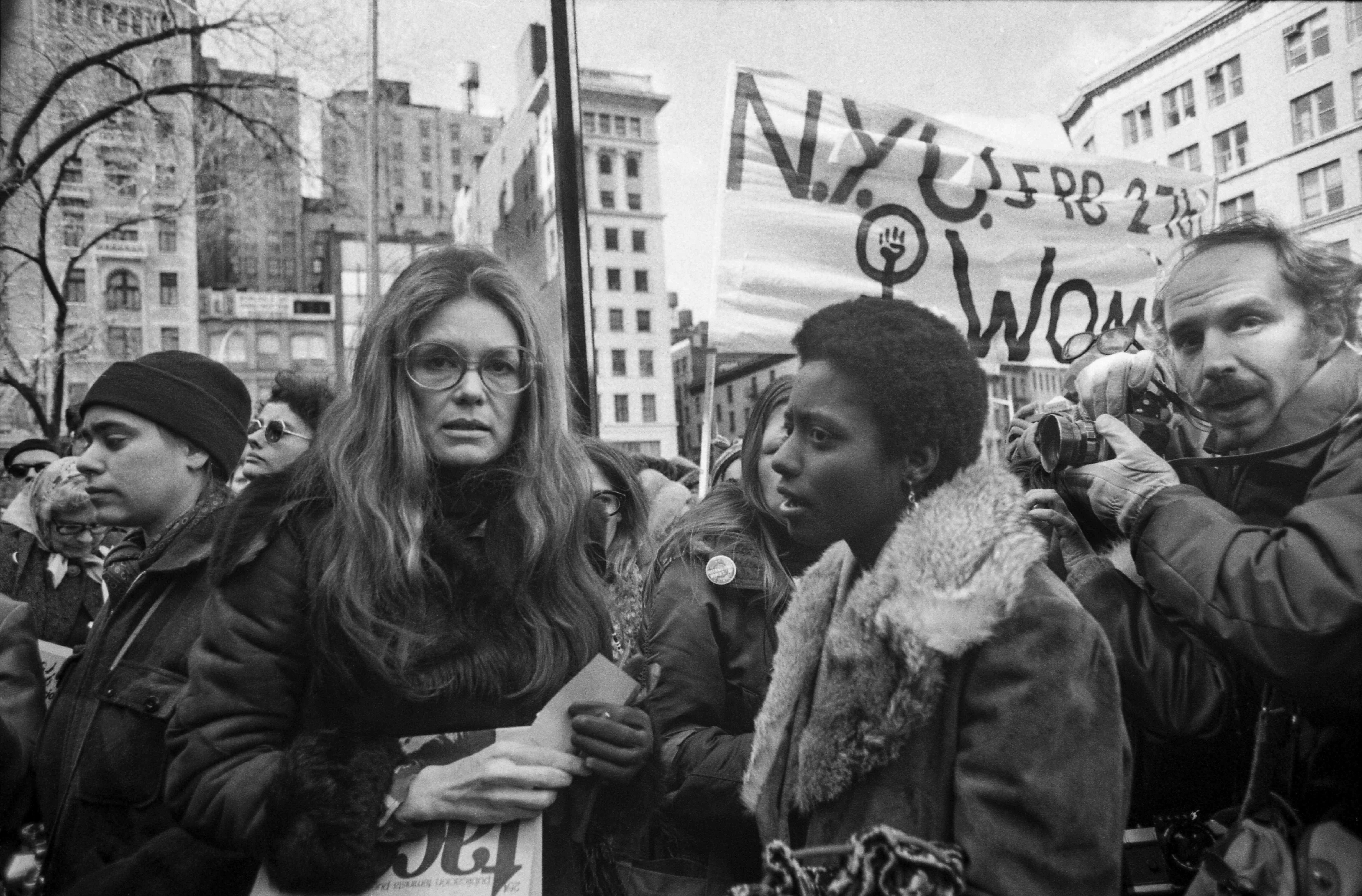 (Original Caption) Rep. Bella Abzug, (D-N.Y.), feminist Gloria Steinem and Lt. Gov. Maryann Krupsak of New York (L-R) chat with the marchers and newsmen in midtown Manhattan prior to the start of the International Women's Day March. Some 2,000 women from all walks of life joined the solidarity march in which they demanded full economic political, legal, sexual and racial equality and the right to control their own lives and bodies. (Photo by Bettmann Archive/Getty Images)