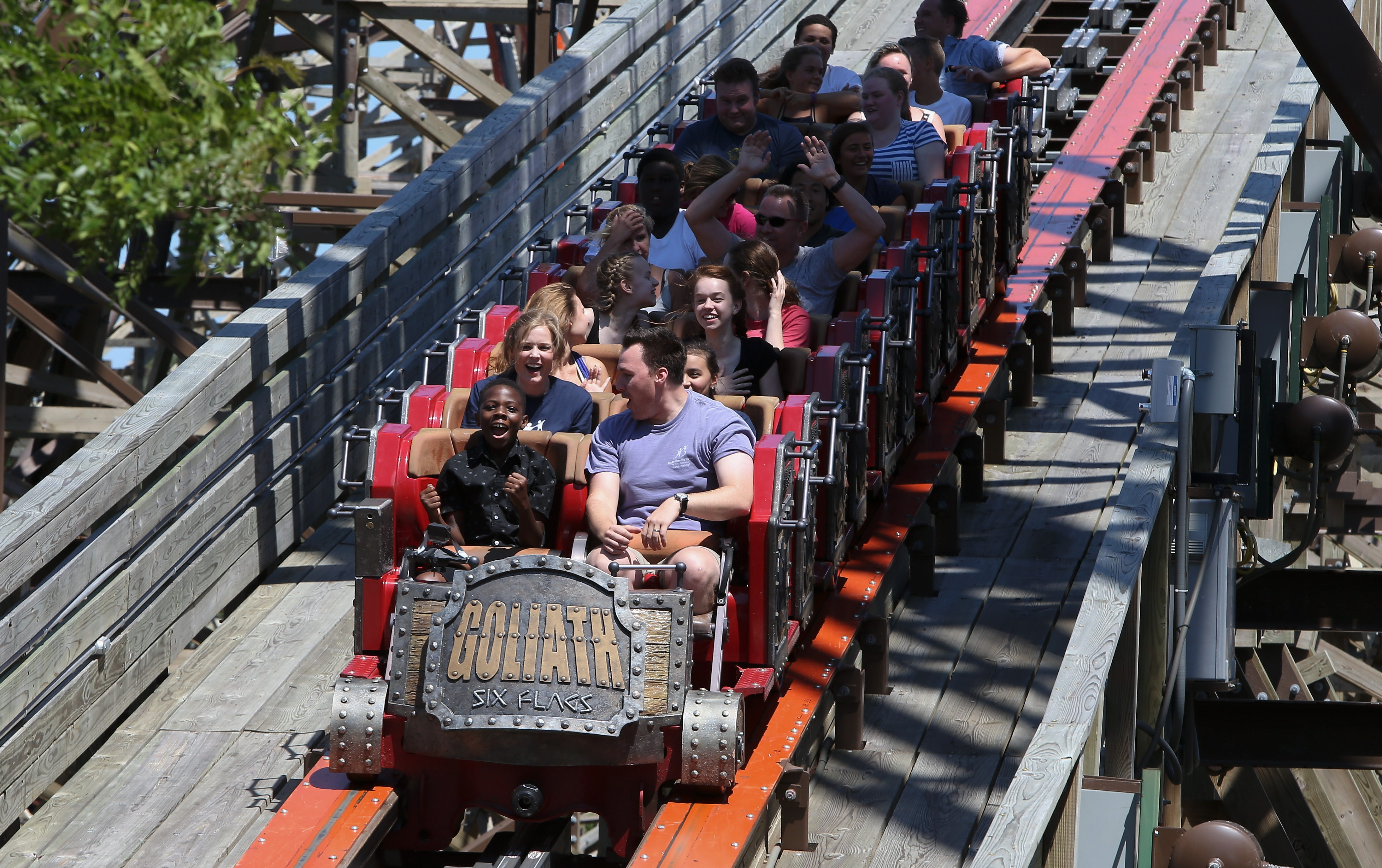 CHICAGO, IL - AUGUST 08: Members of Big Brothers, Big Sisters, ride Goliath, the worldÕs tallest, steepest and fastest wooden roller coaster at Six Flags Great America, thanks to Wyndham Rewards   on August 8, 2016 in Chicago, Illinois.  (Photo by Tasos Katopodis/Getty Images for Wyndham Rewards)
